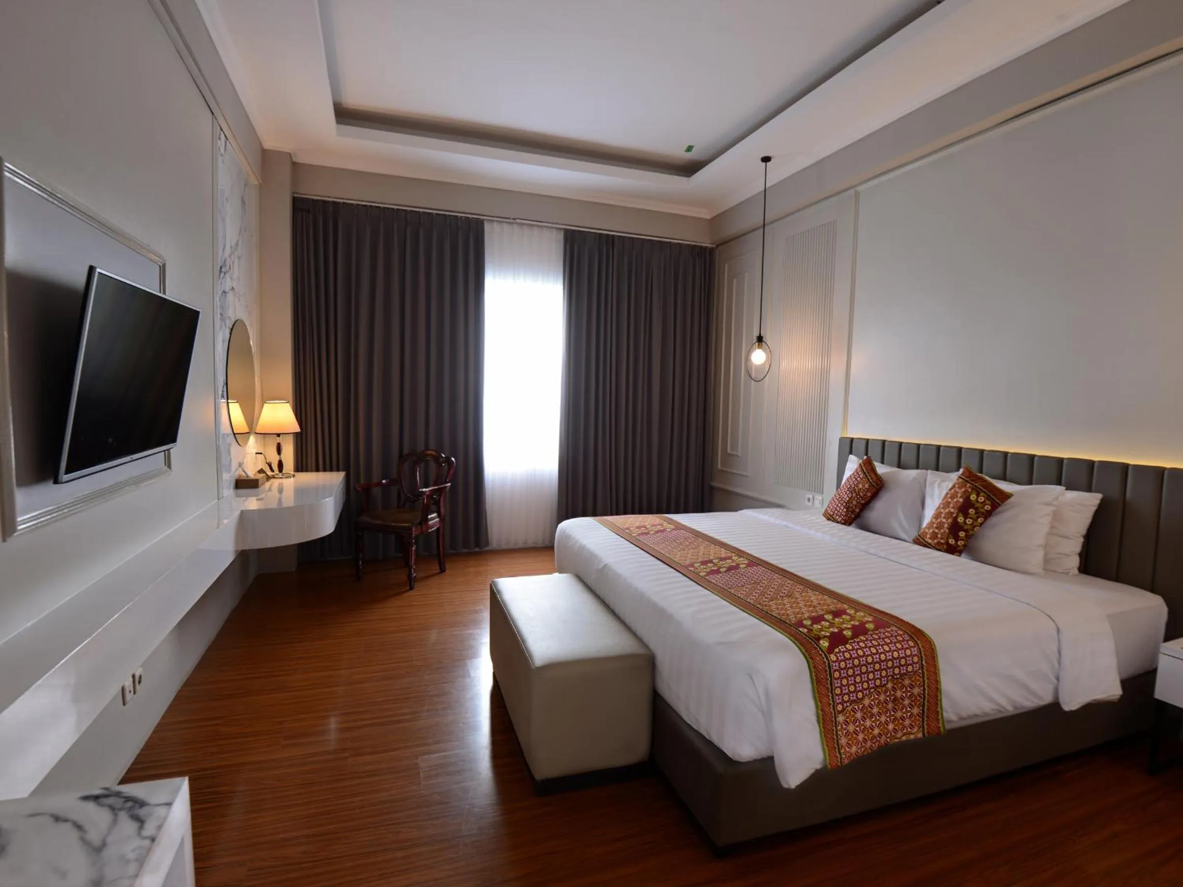 Bedroom, Bed in The Rich Jogja Hotel