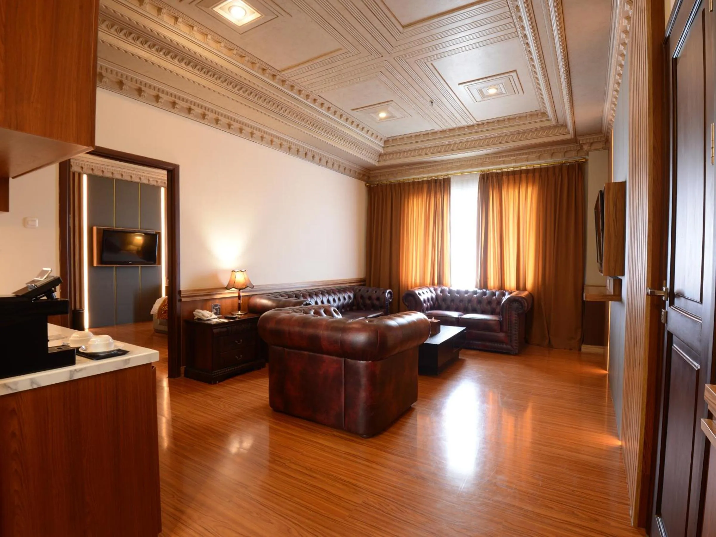 Living room in The Rich Jogja Hotel