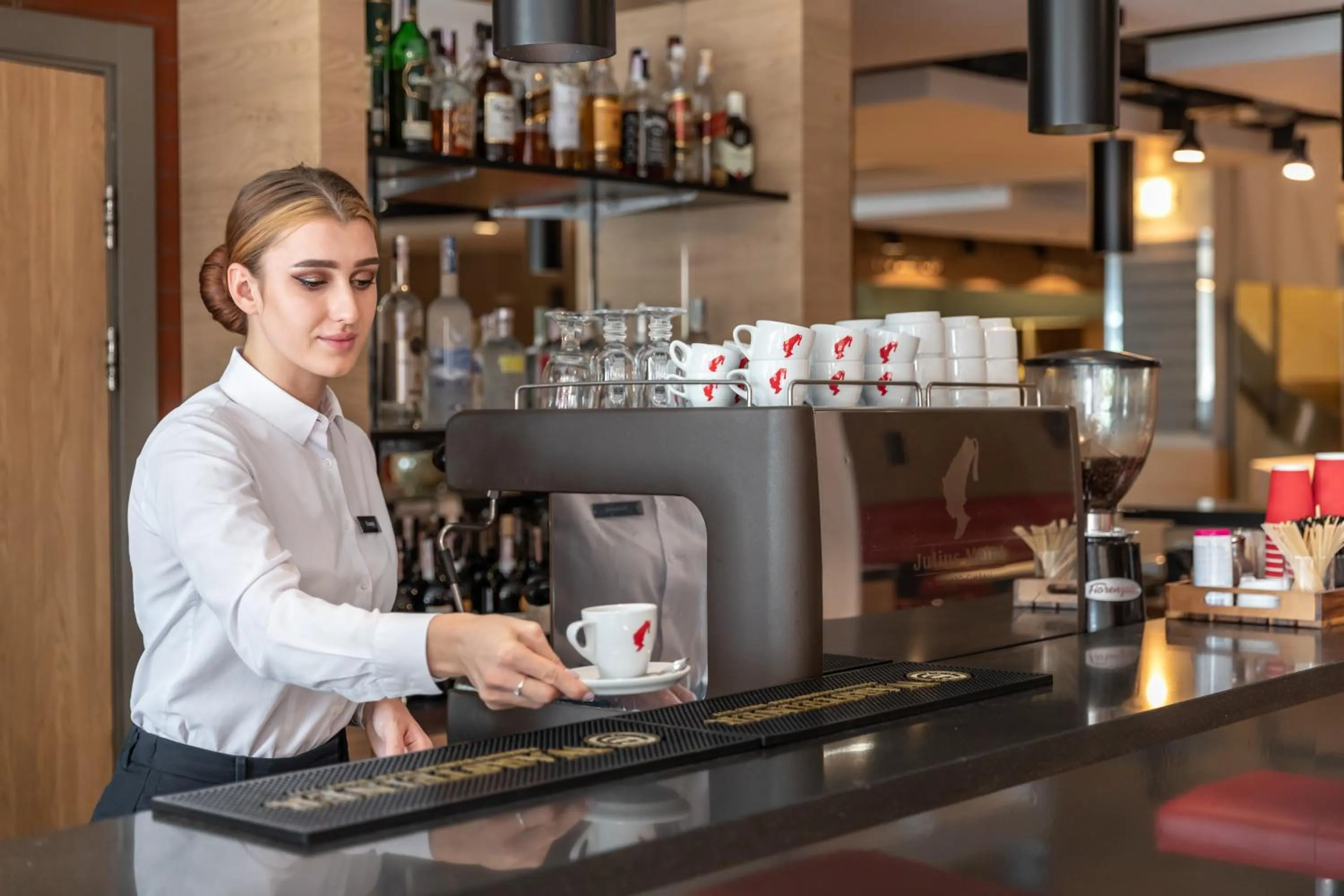 Lounge or bar in Ramada Encore Kyiv