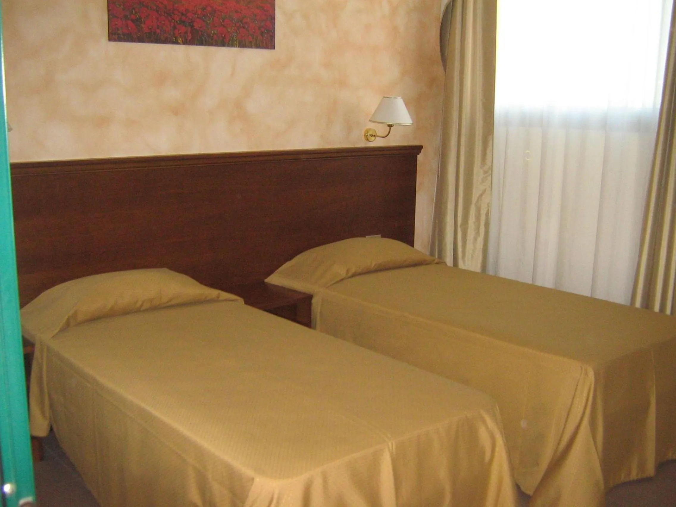 Bed in Hostiliae Ciminiera Hotel
