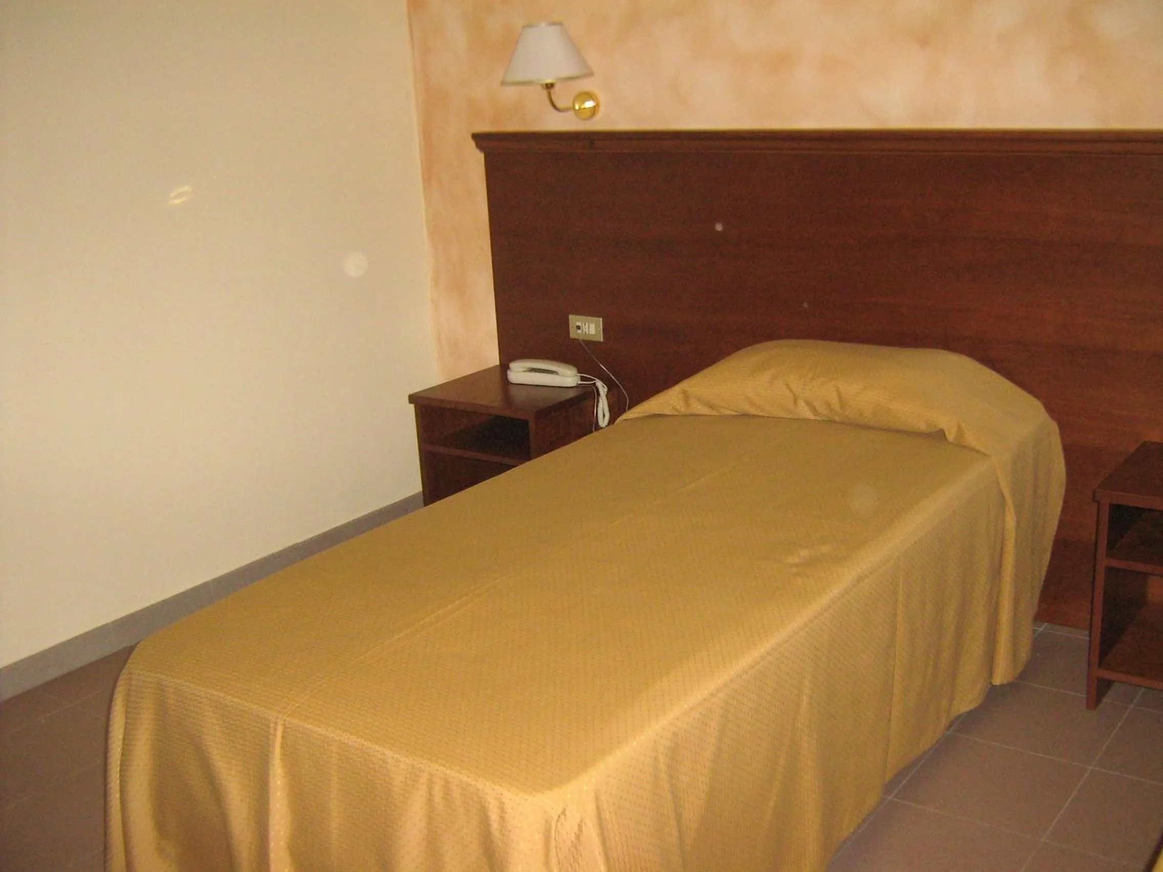 Bed in Hostiliae Ciminiera Hotel