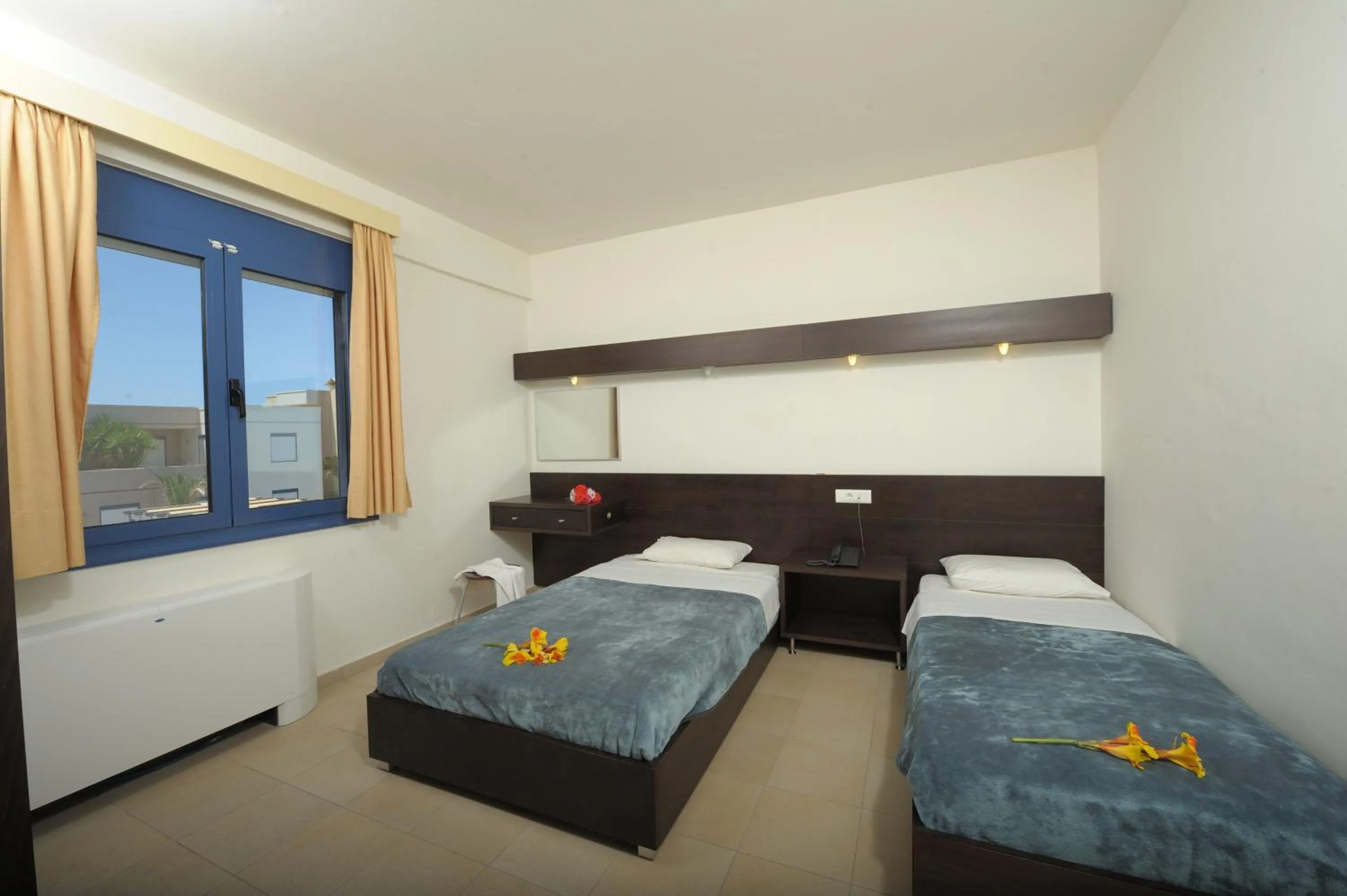 Bed in Meropi Hotel & Apartments