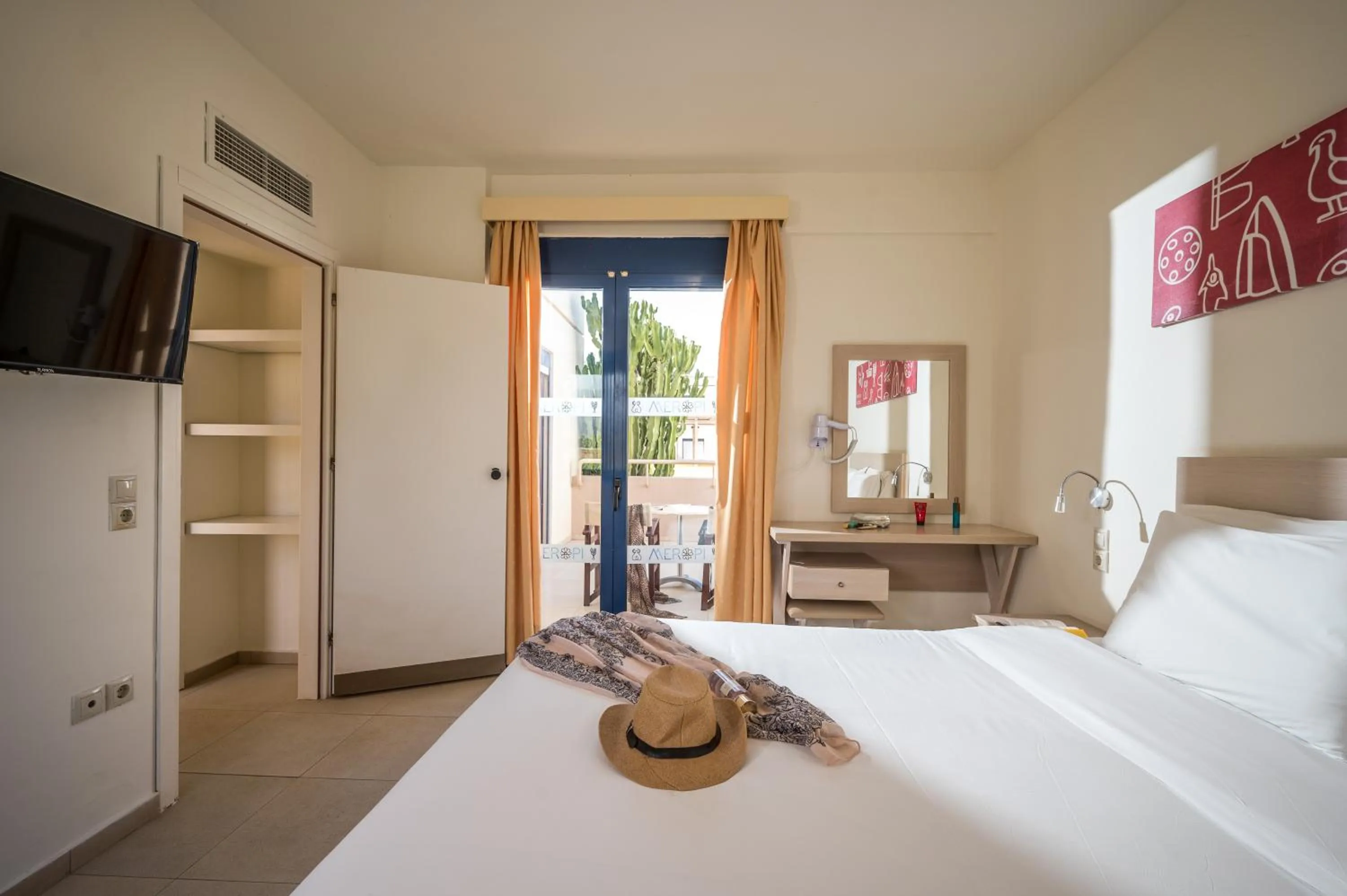 Bed in Meropi Hotel & Apartments