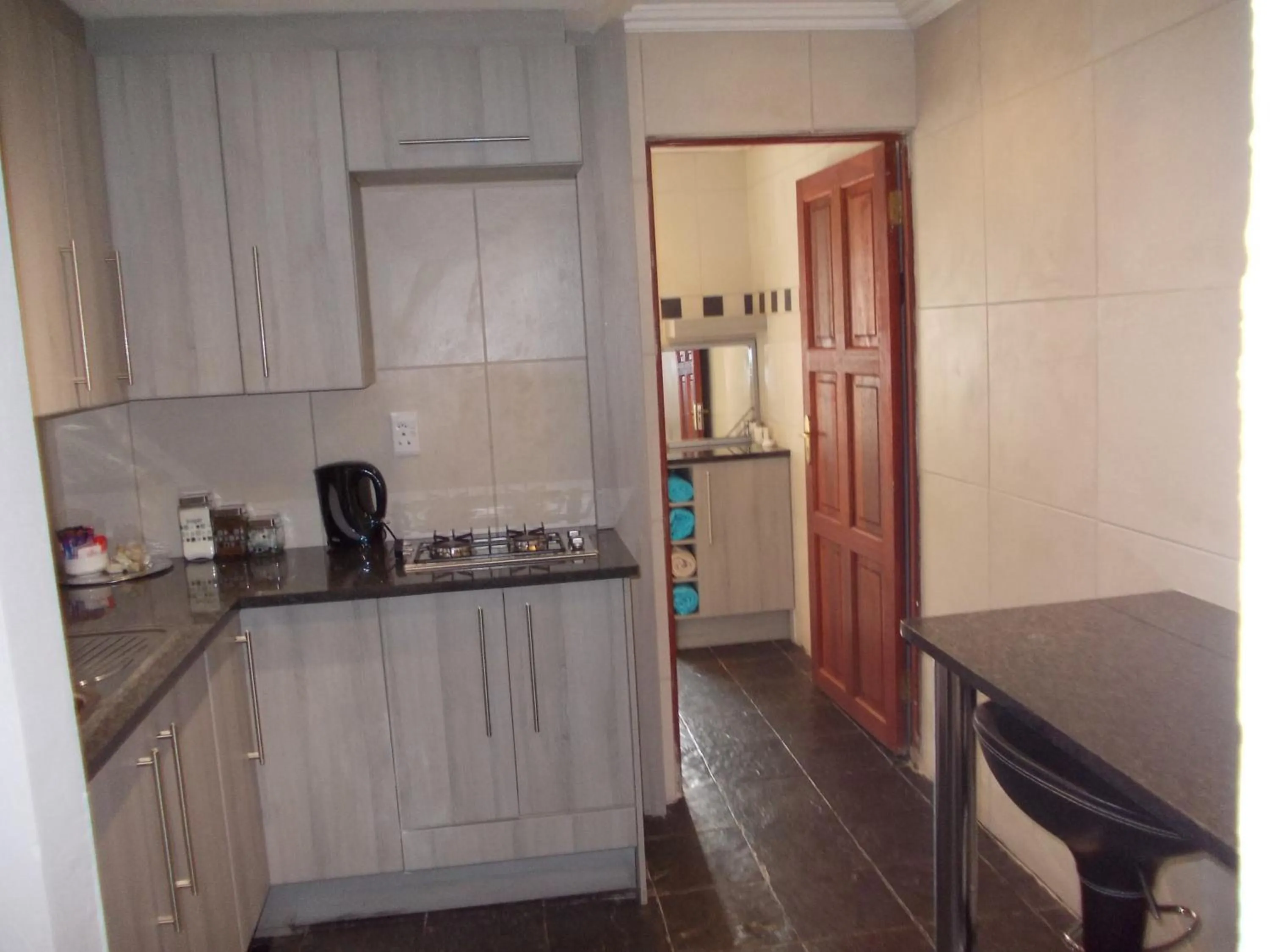 Kitchen or kitchenette in Homestay Travel Guest House