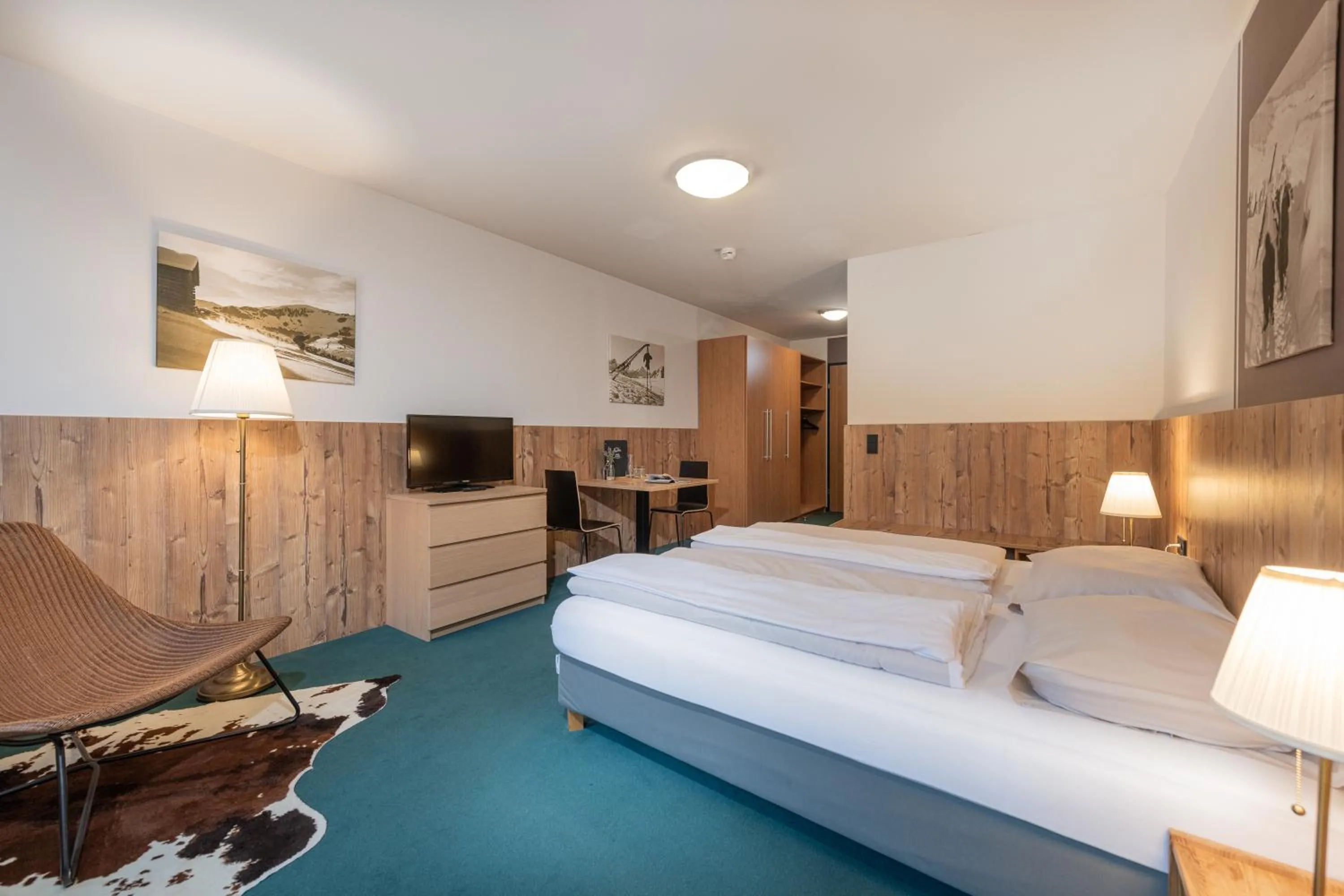 Bed in AlpenParks Hotel MONTANA