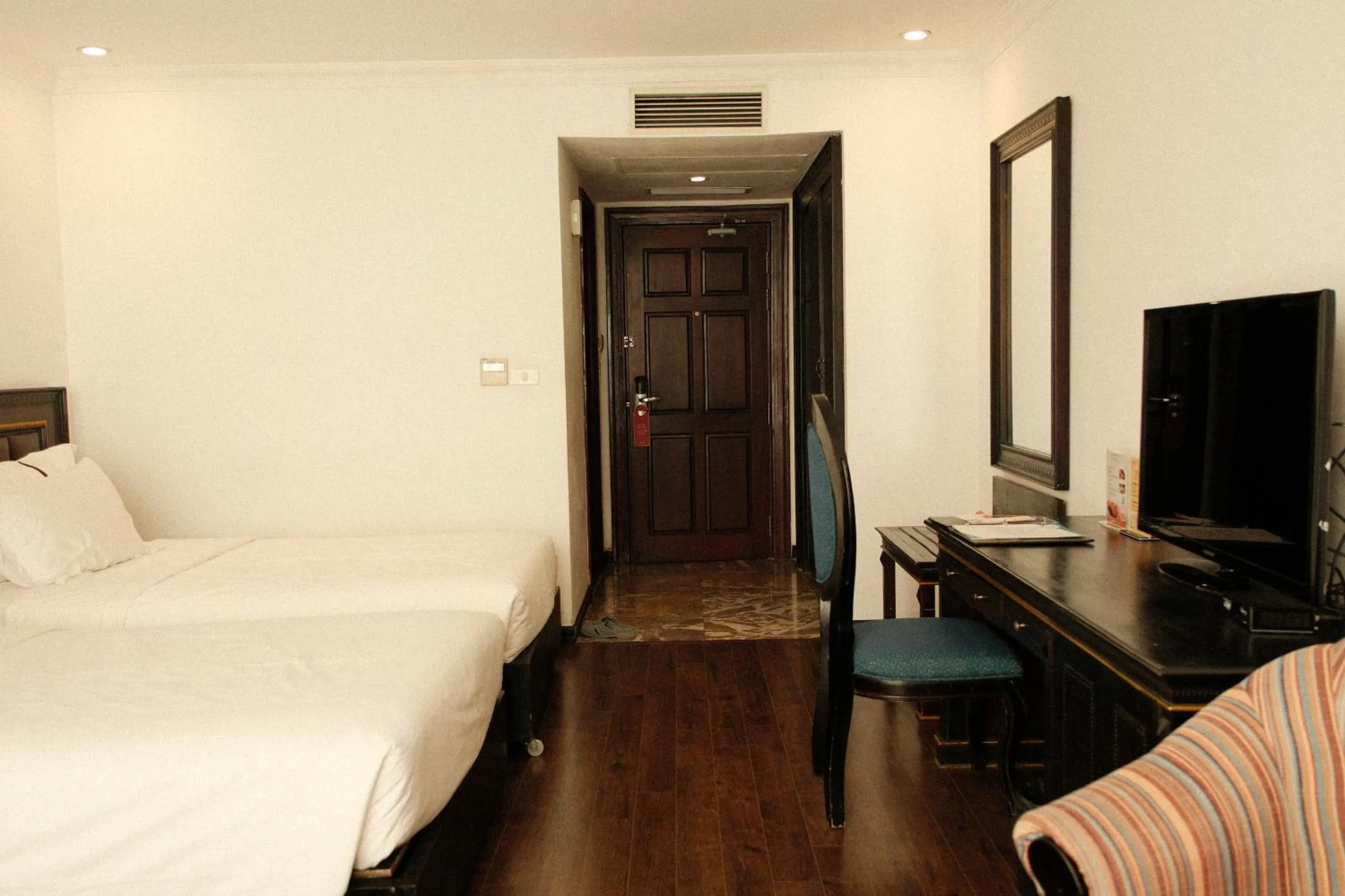 Bed in The Vissai Hotel