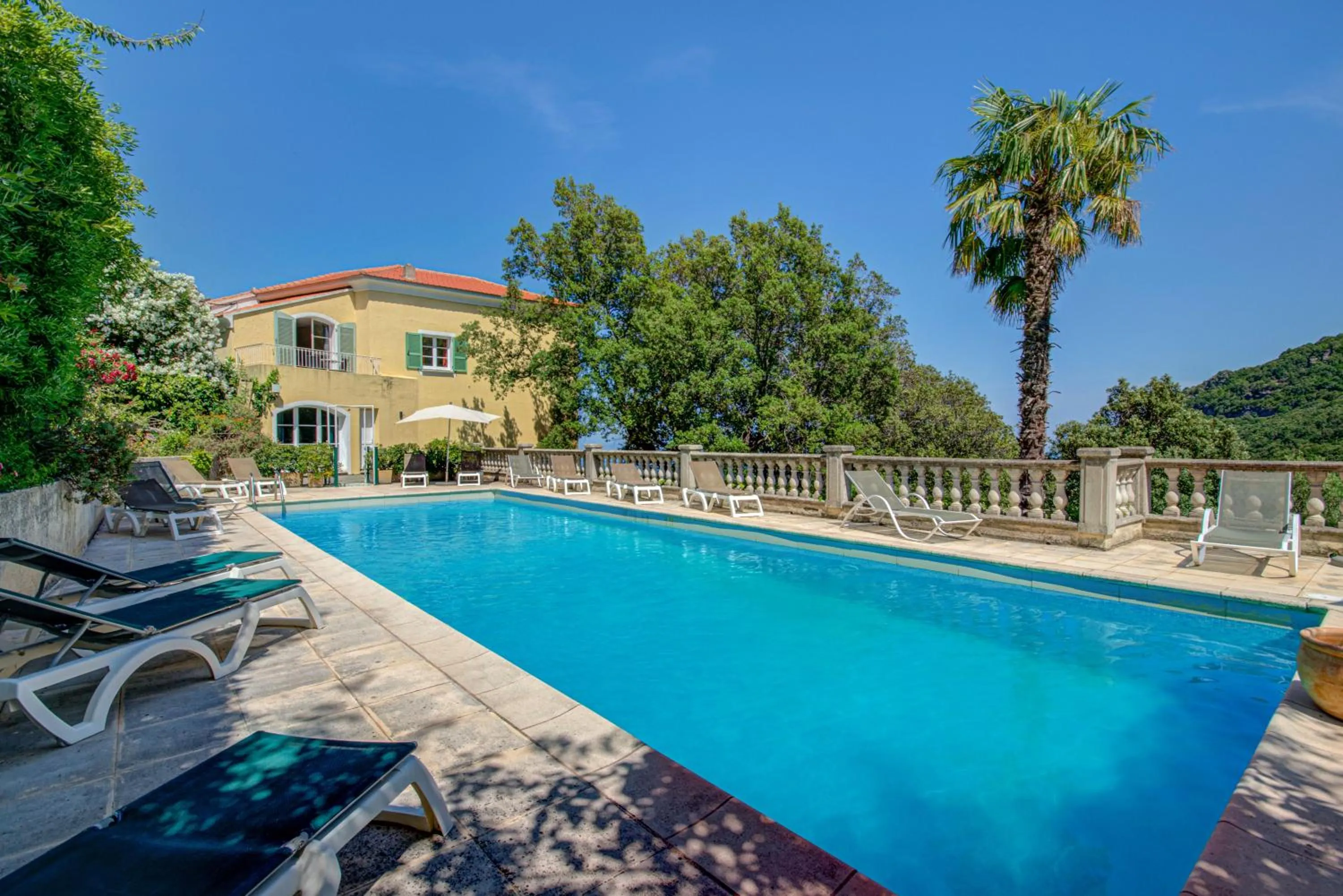 Swimming pool in Hôtel Restaurant la Corniche