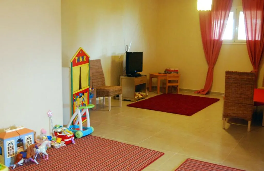 Communal lounge/ TV room in Astrolabe Hotel