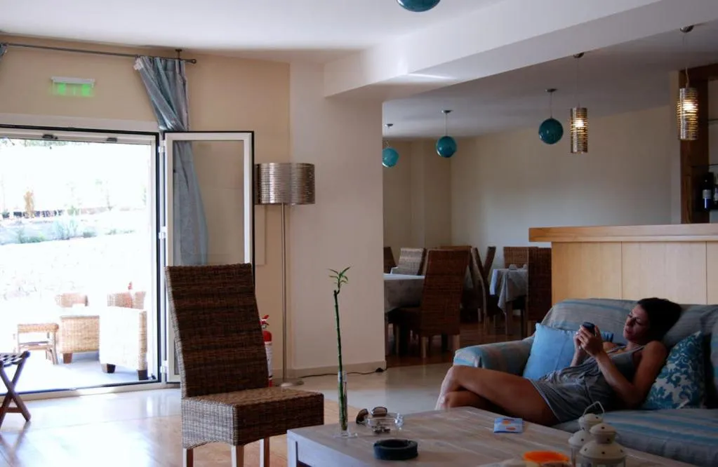 Communal lounge/ TV room in Astrolabe Hotel