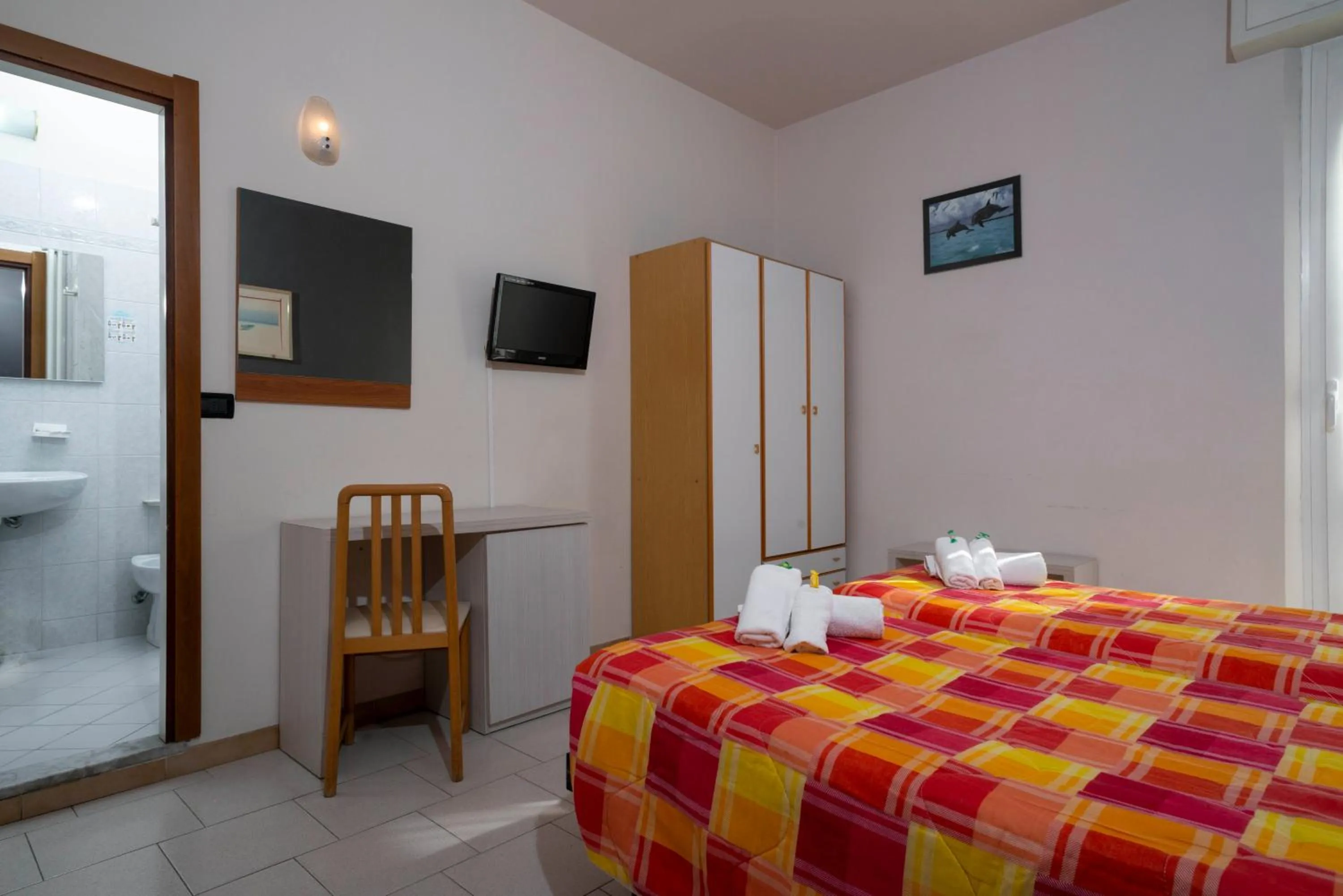 Bed in Hotel Petrarca