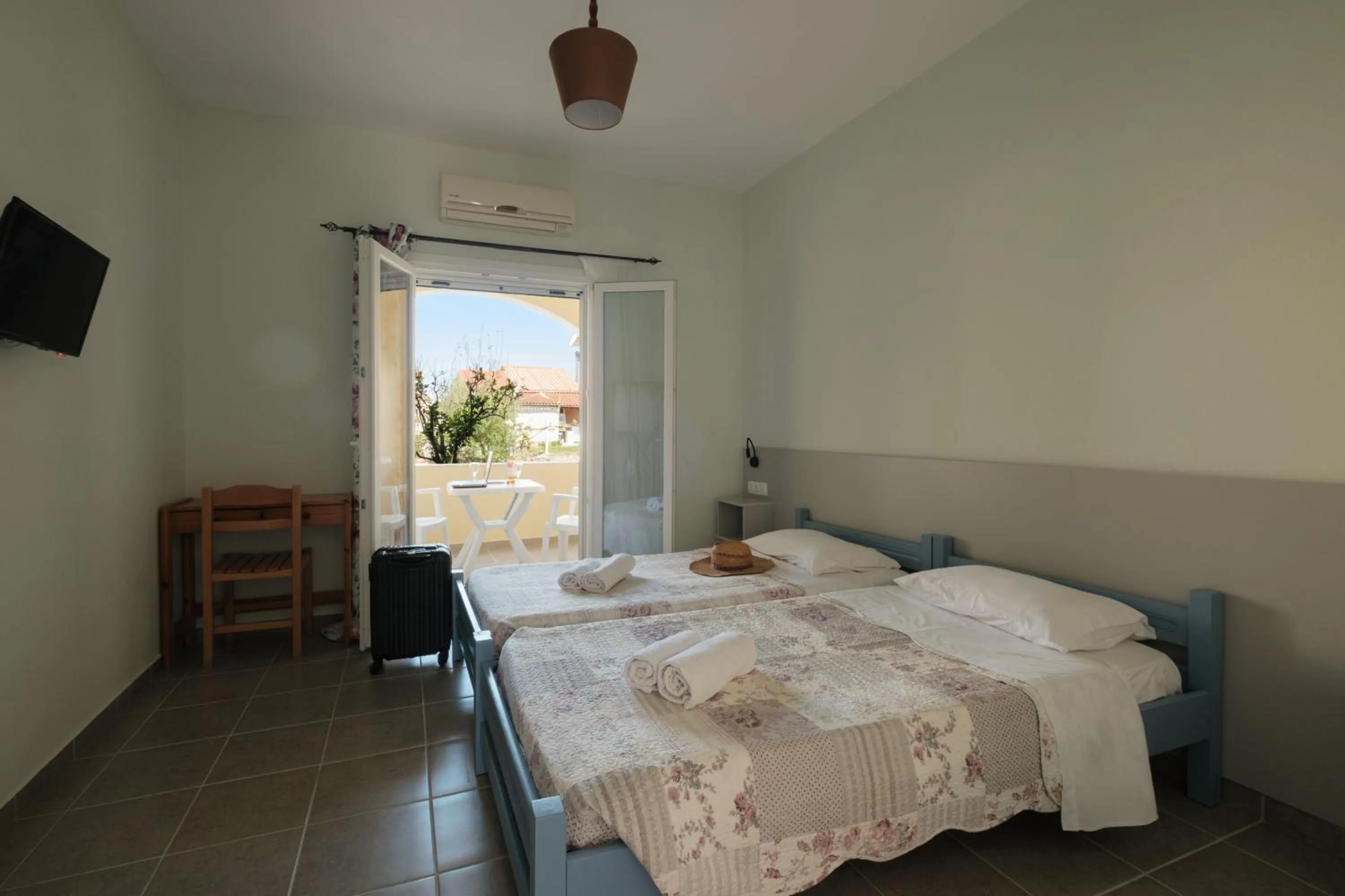 Bed in Feeloxenia Corfu Apartments