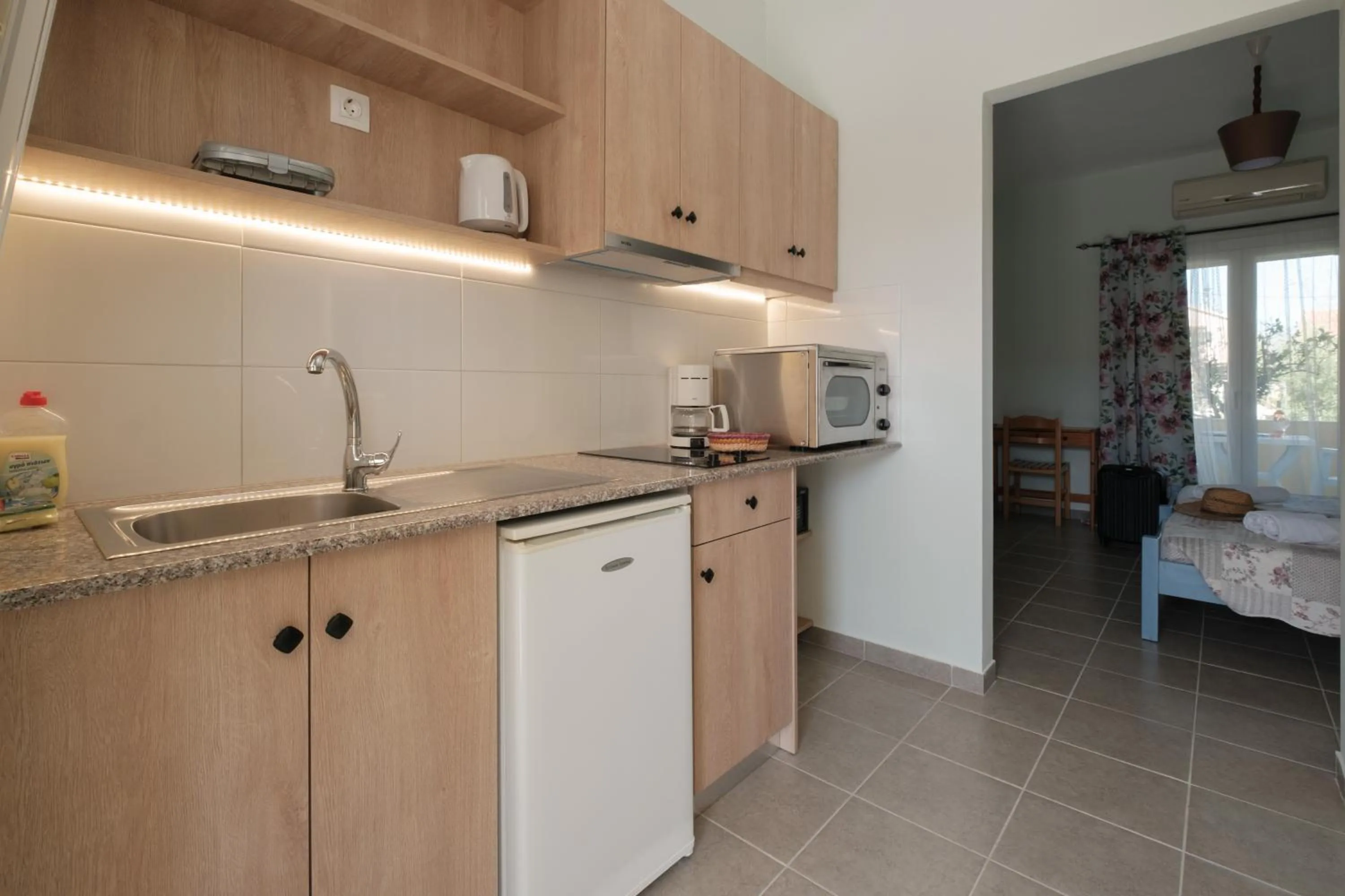 Kitchen or kitchenette in Feeloxenia Corfu Apartments