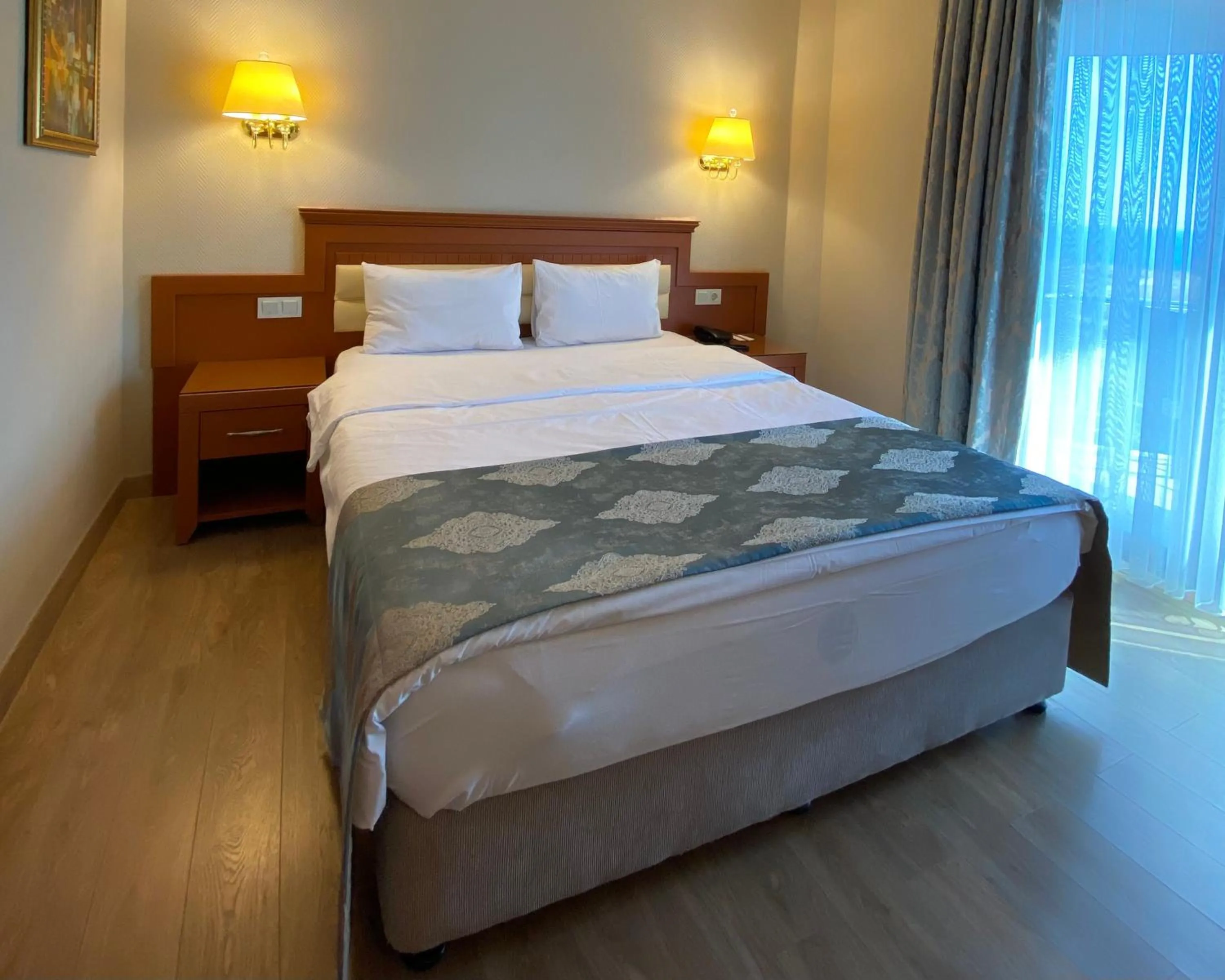 Bed in Premier Vista Hotel