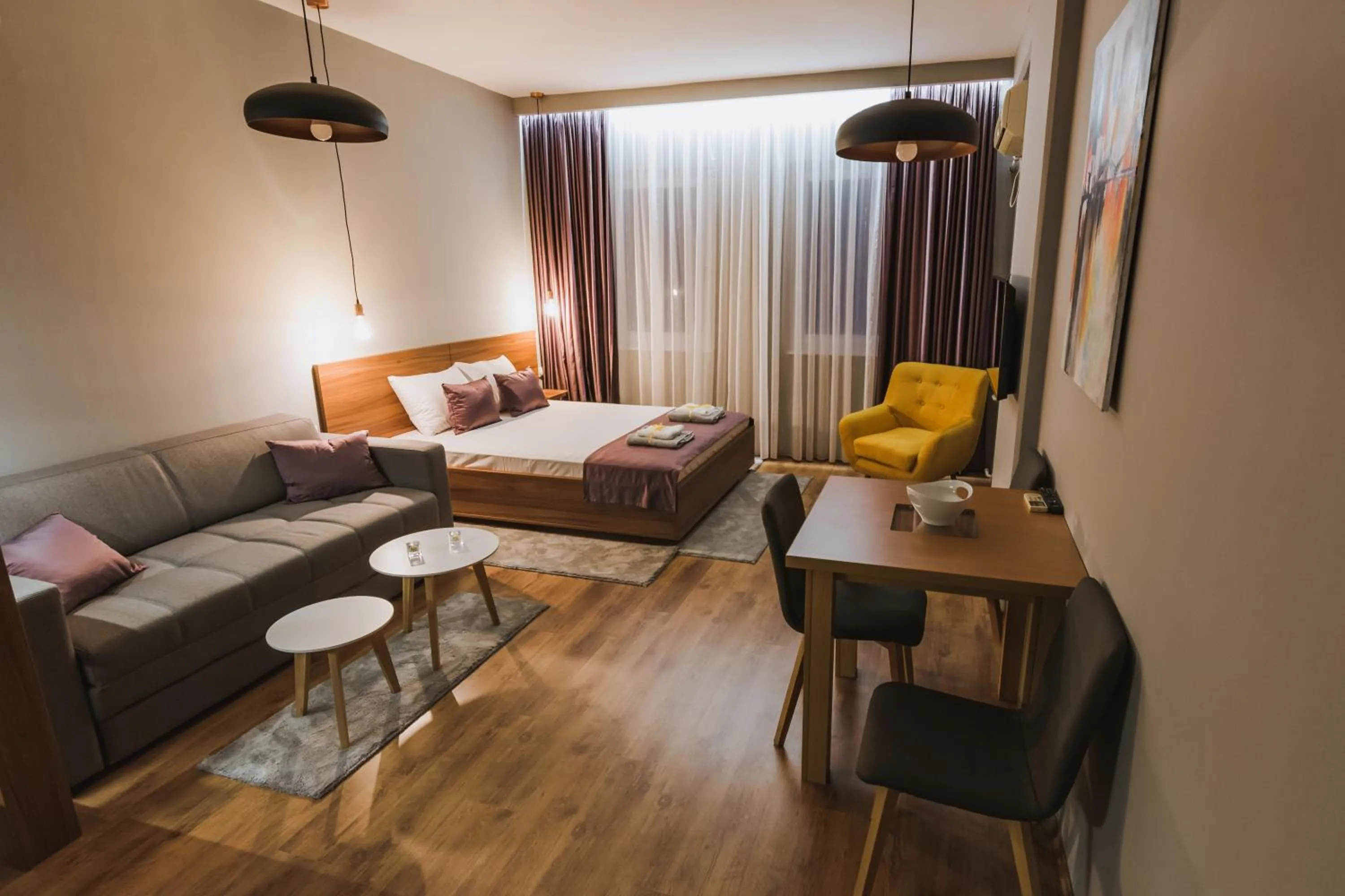 Bed in Central Plaza Apartments
