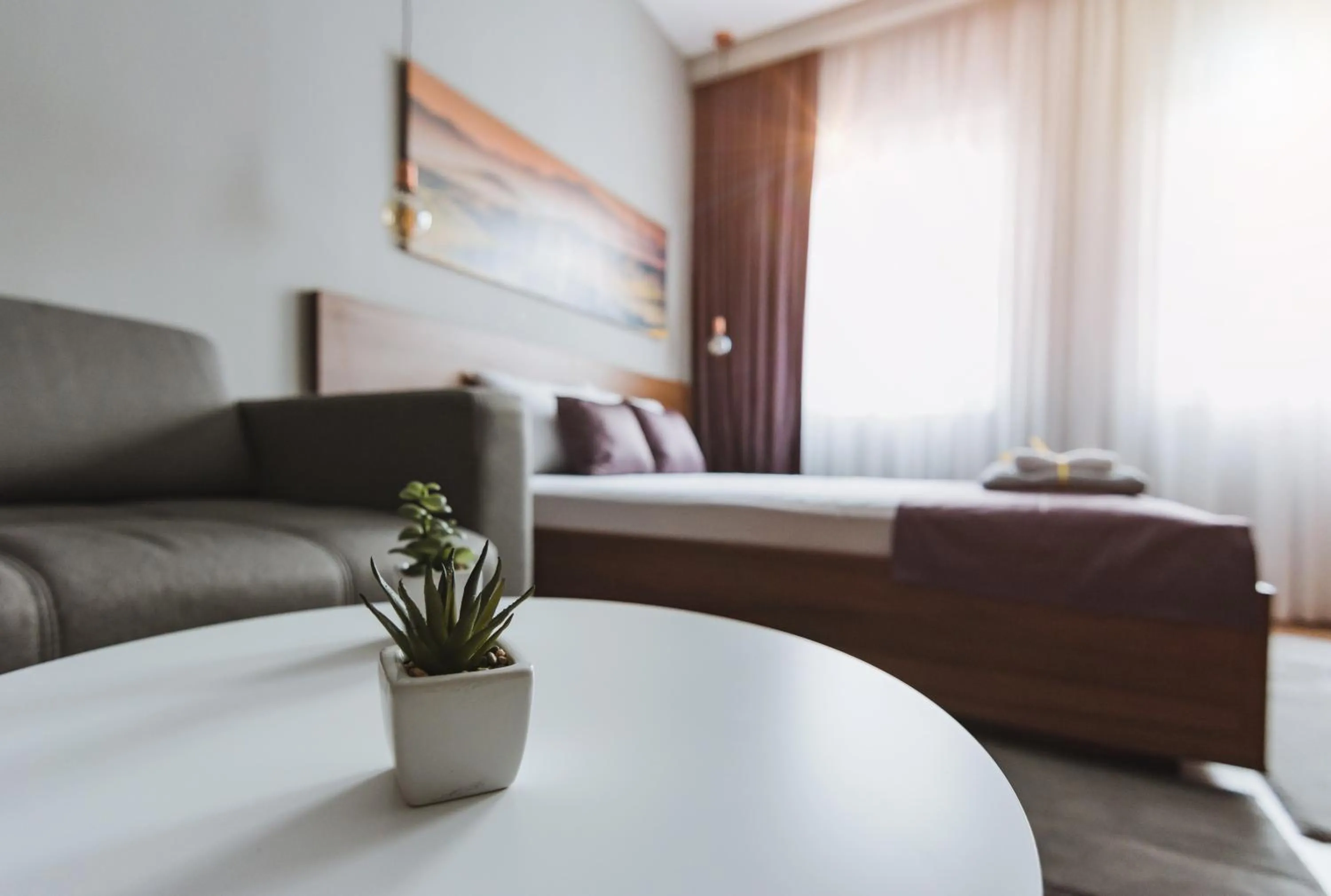 Bed in Central Plaza Apartments