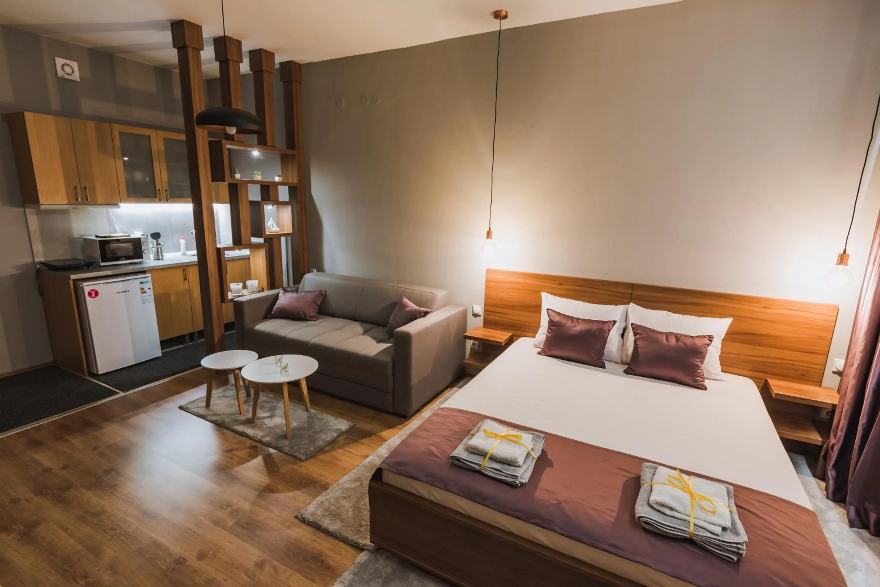 Bed in Central Plaza Apartments