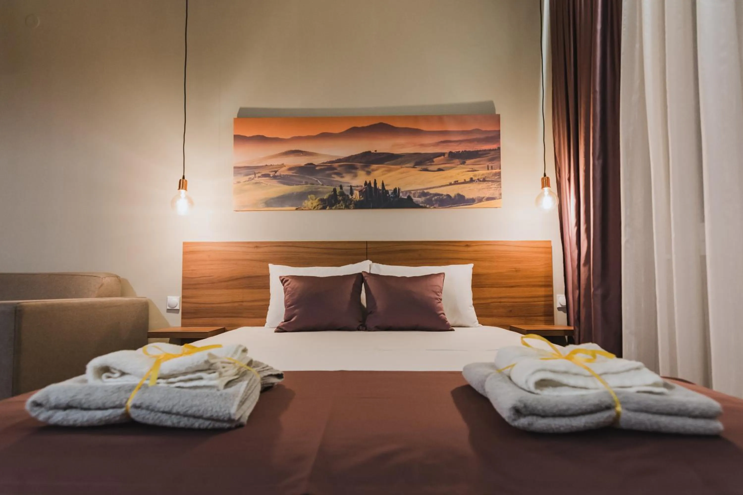Bed in Central Plaza Apartments