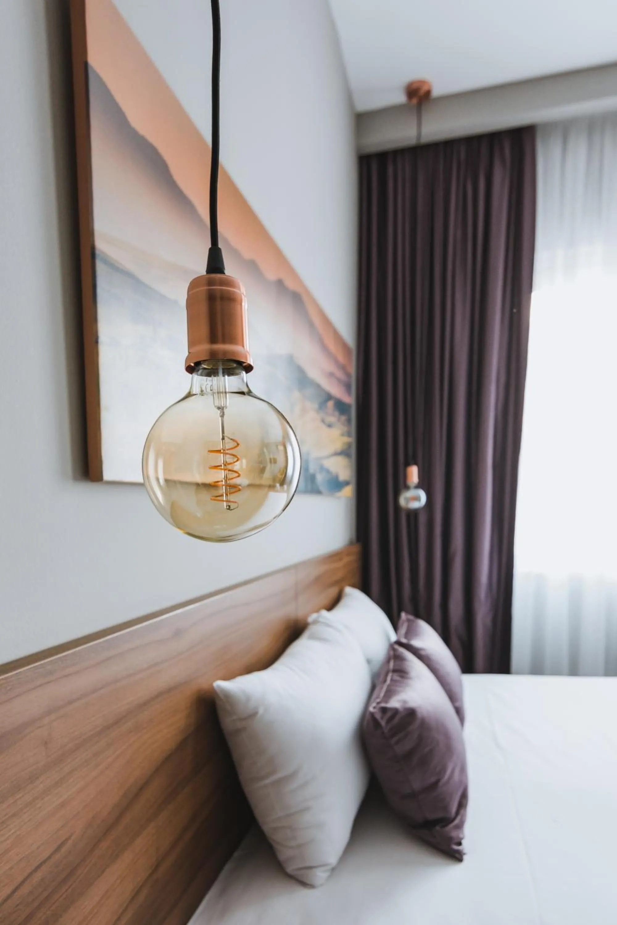 Bed in Central Plaza Apartments