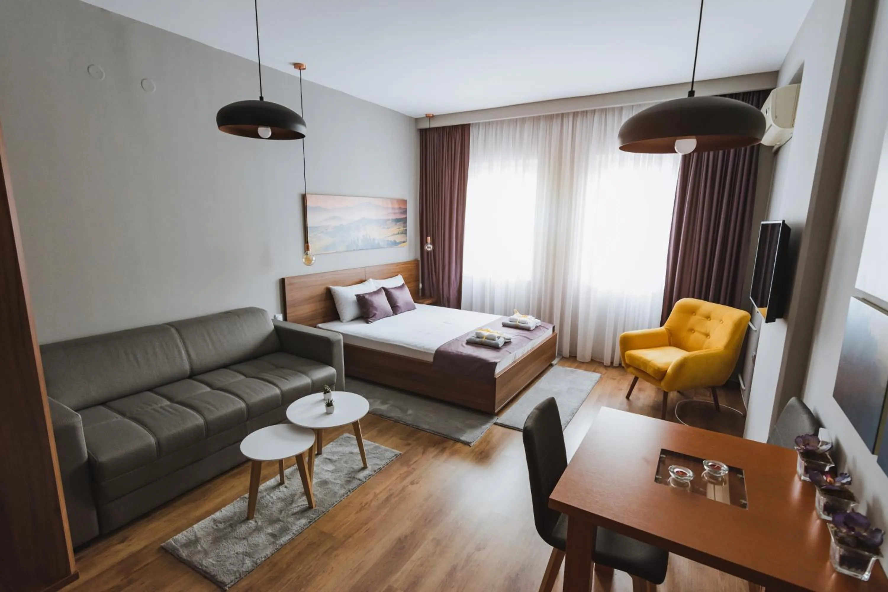 Bed in Central Plaza Apartments