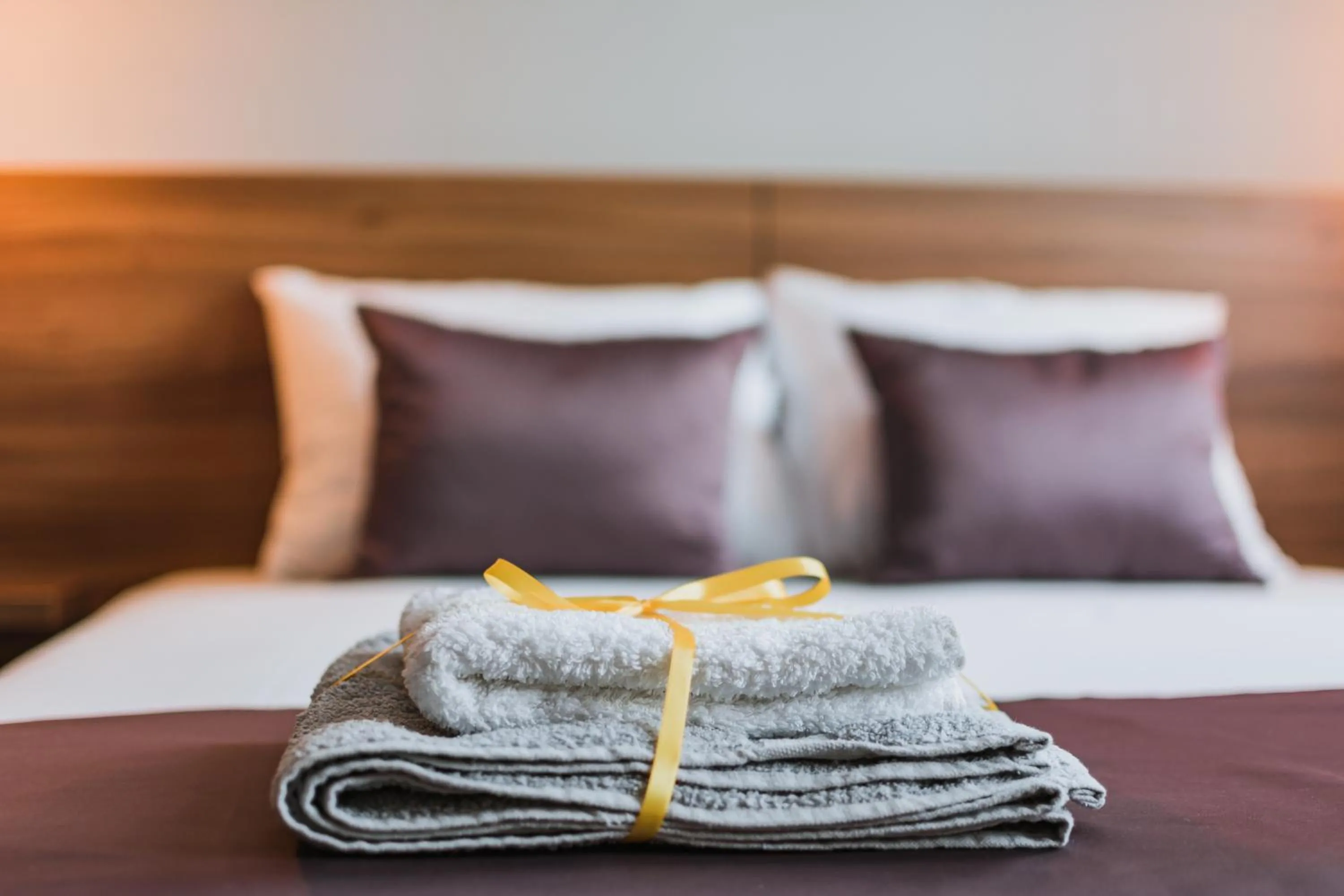 Bed in Central Plaza Apartments