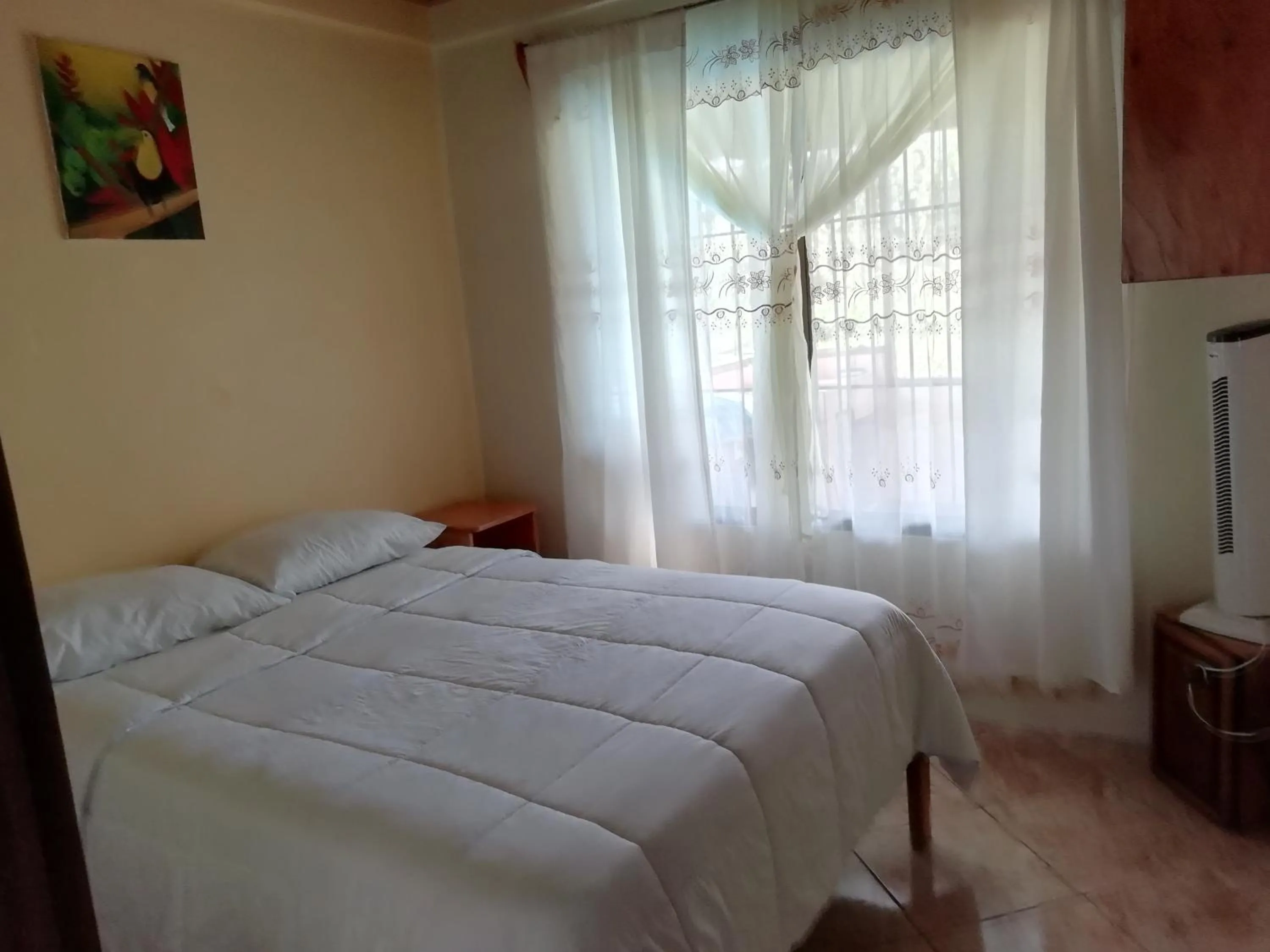 Bed in Casas de Campo Las Pavitas Cottages "Red Frog"
