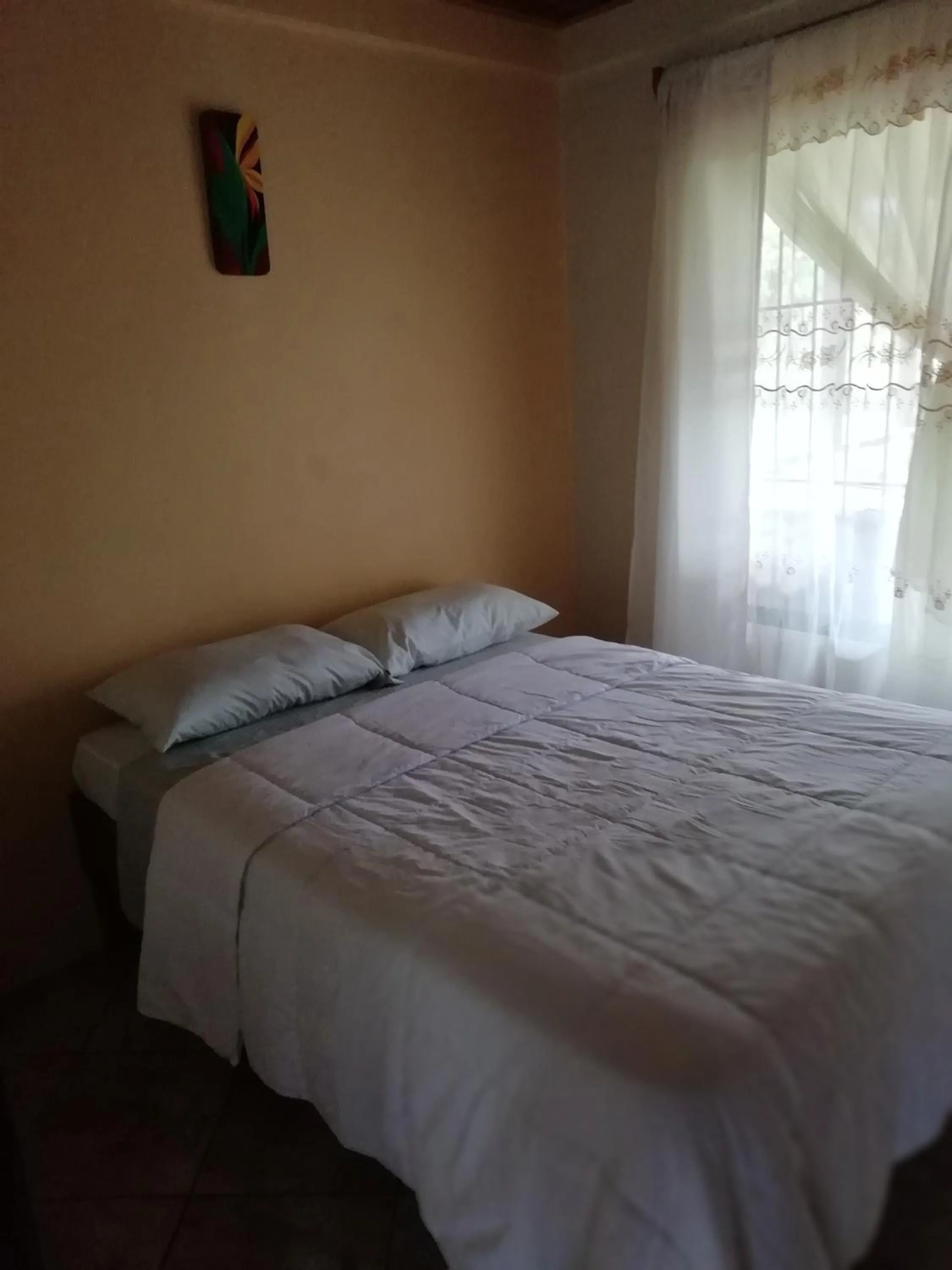 Bed in Casas de Campo Las Pavitas Cottages "Red Frog"