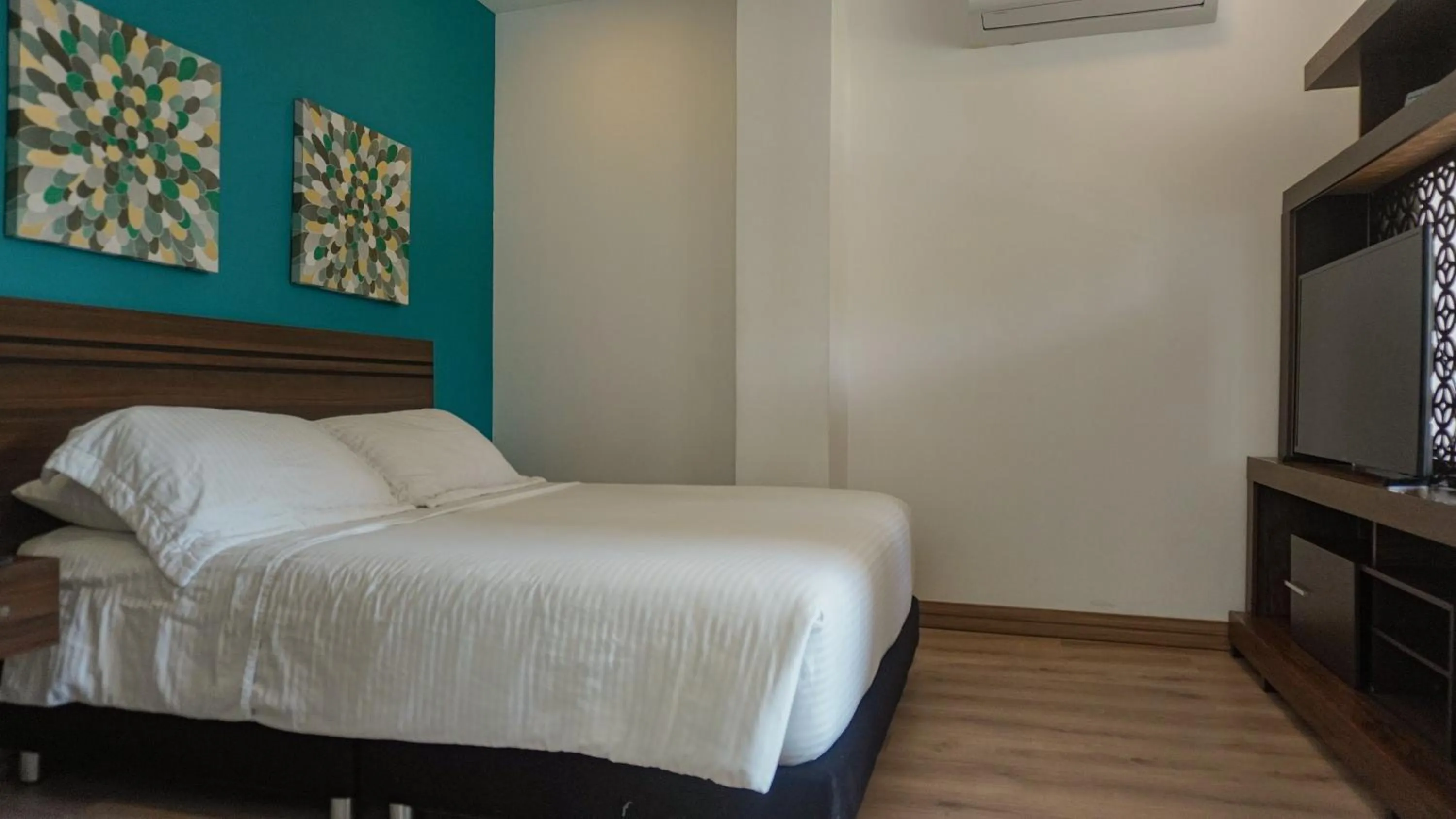 Bed in Malik Hotel Boutique