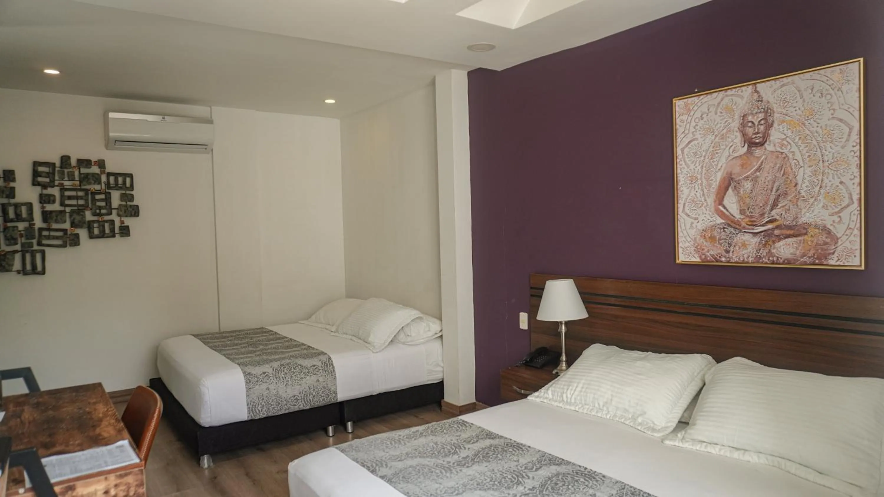 Bed in Malik Hotel Boutique