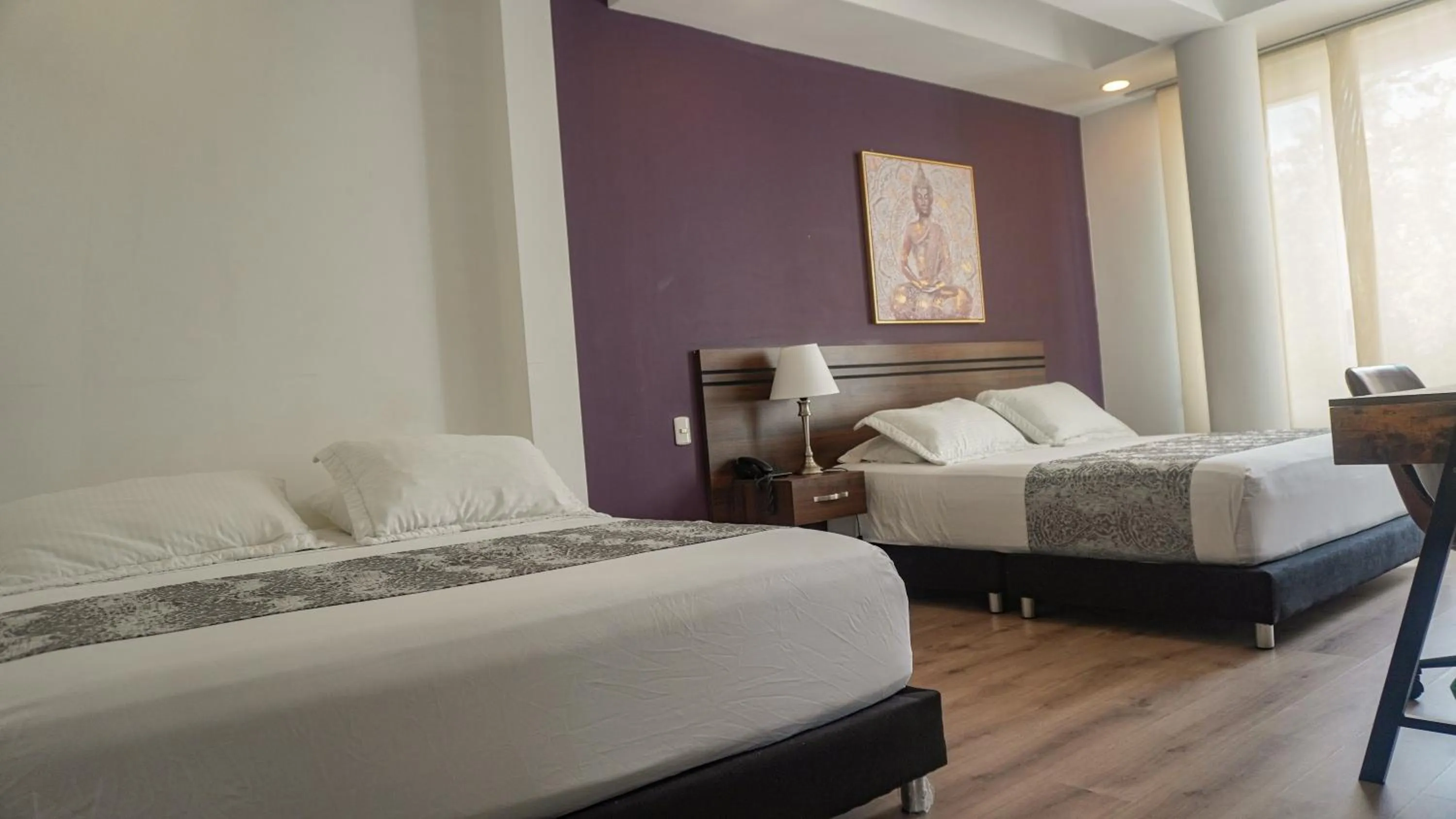 Bed in Malik Hotel Boutique