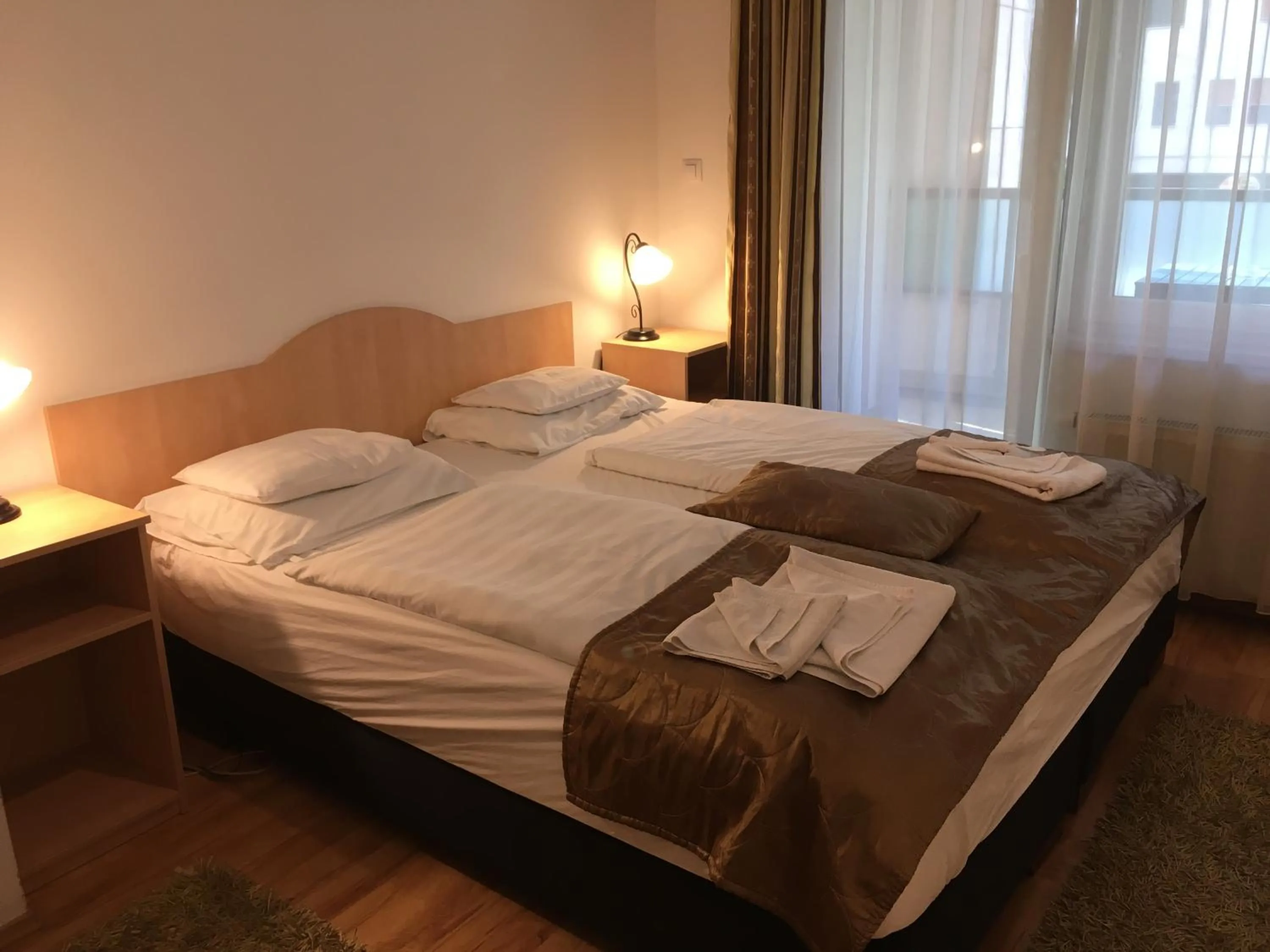 Bed in Corvin Residence Apartments