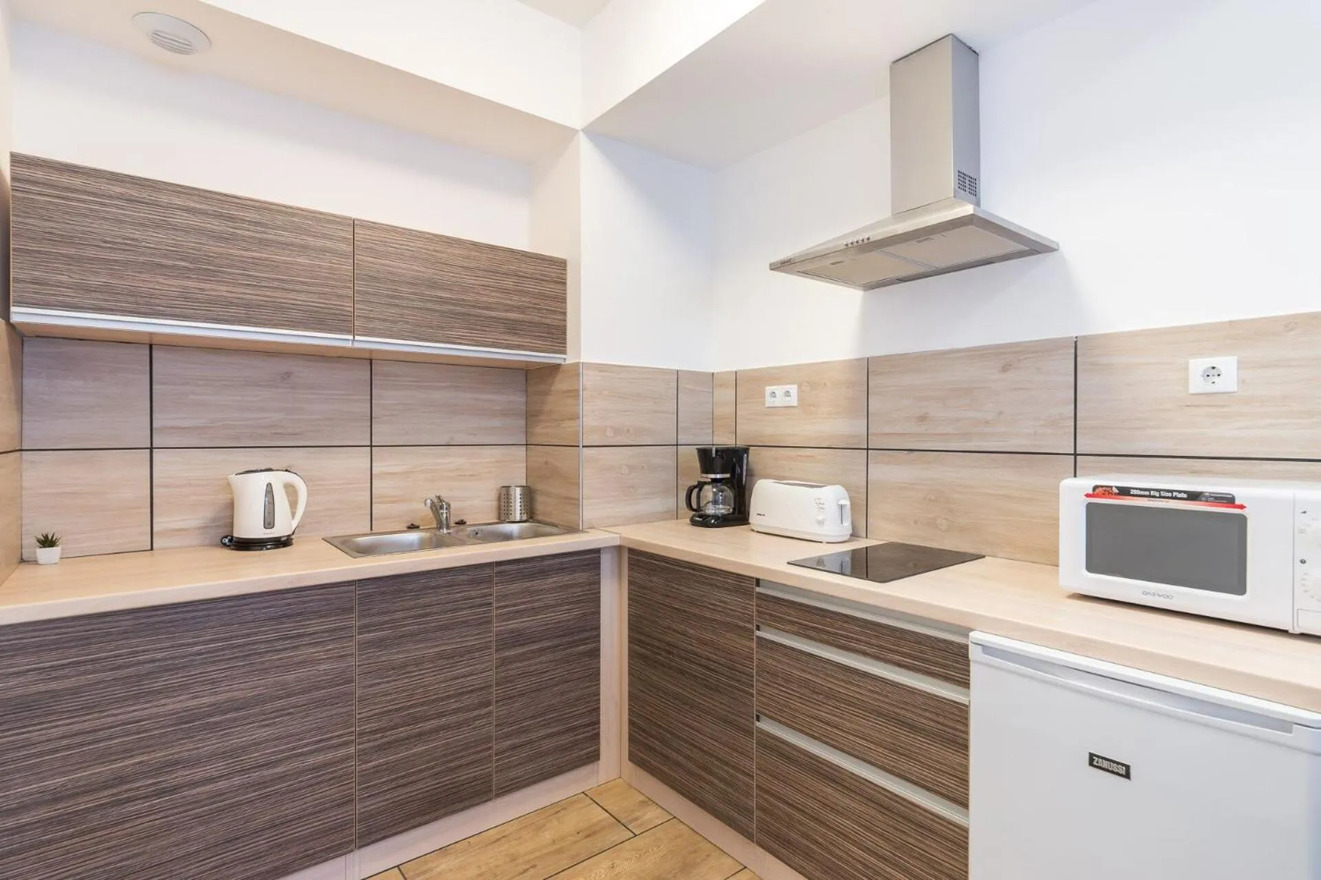 Kitchen or kitchenette in Corvin Residence Apartments