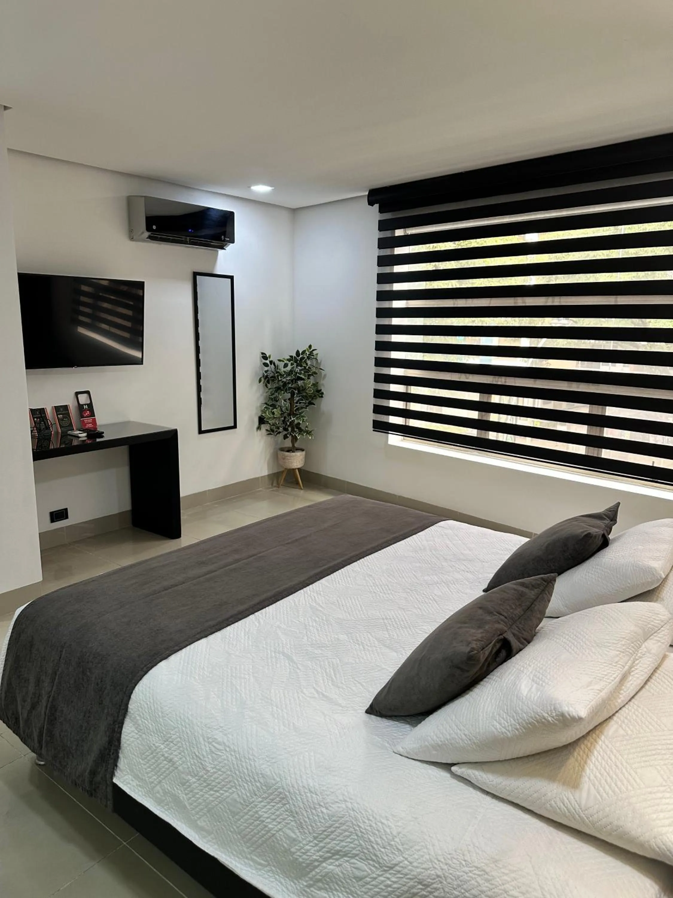 Bed in Hotel Merlott 70