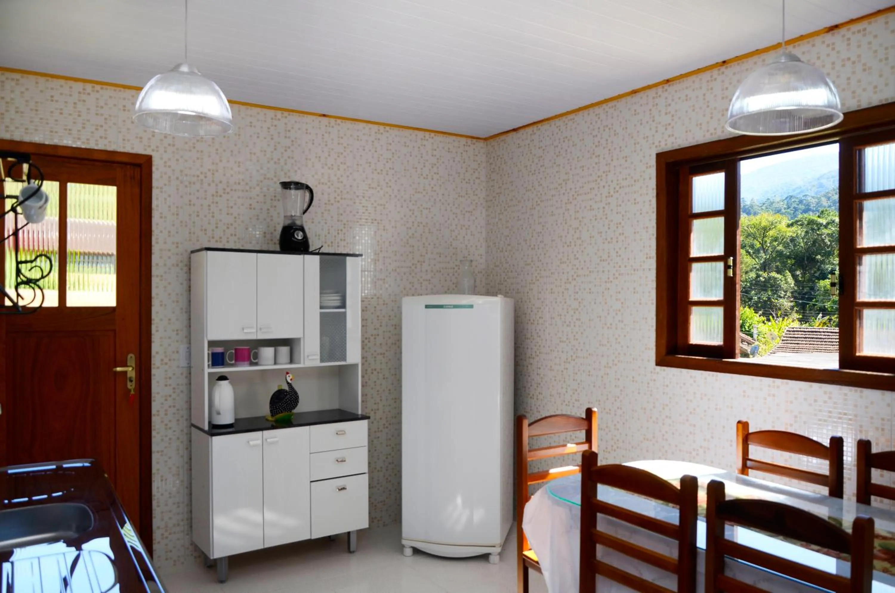 Kitchen or kitchenette in Pousada Sabor da Serra