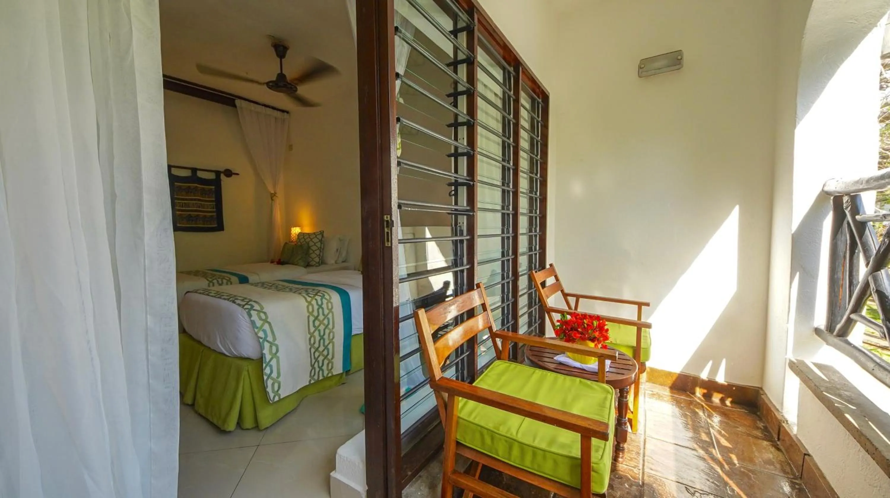 Bed in Papillon Lagoon Reef Hotel