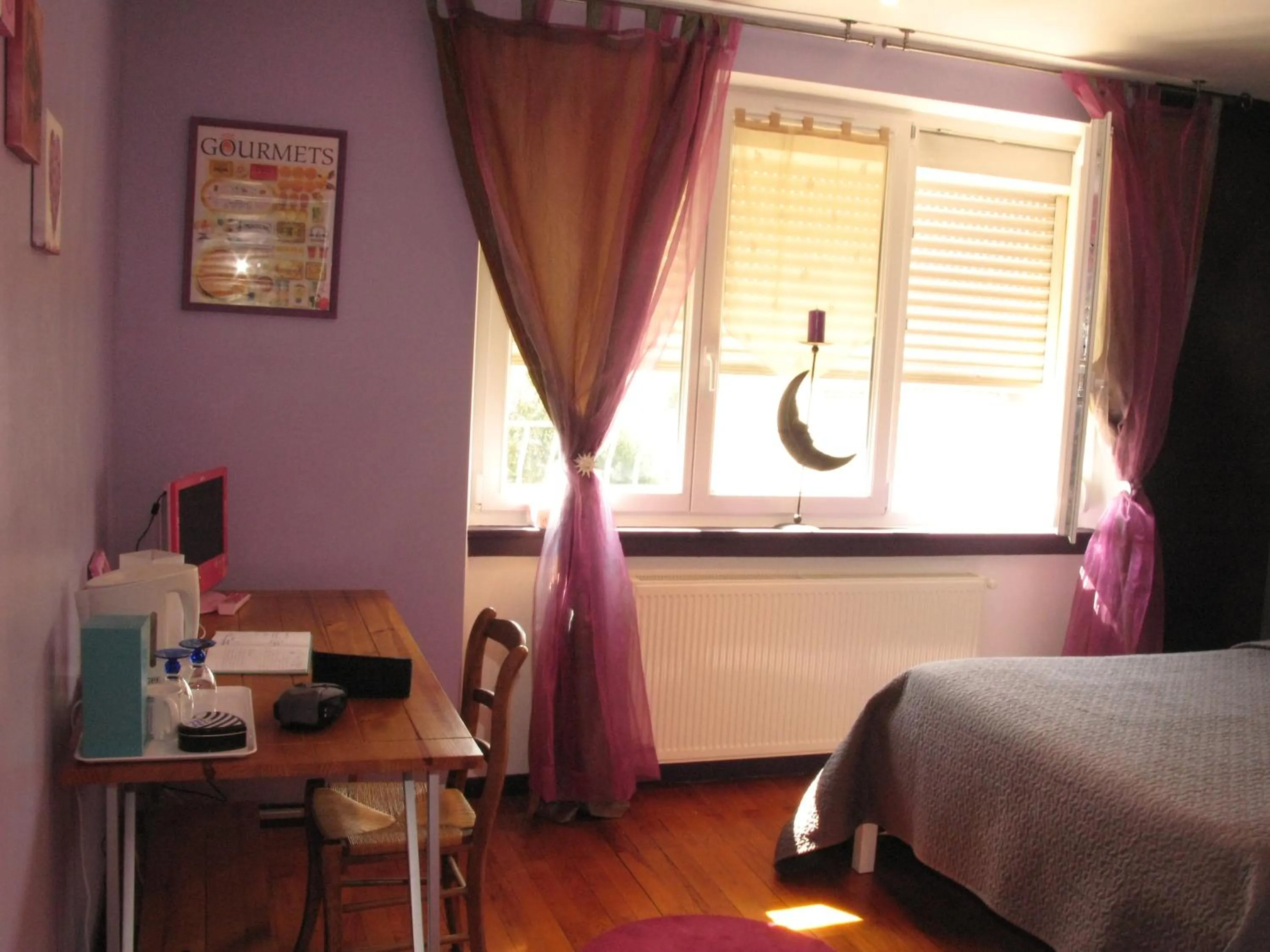 Bed in Les Chambres de l'Ile