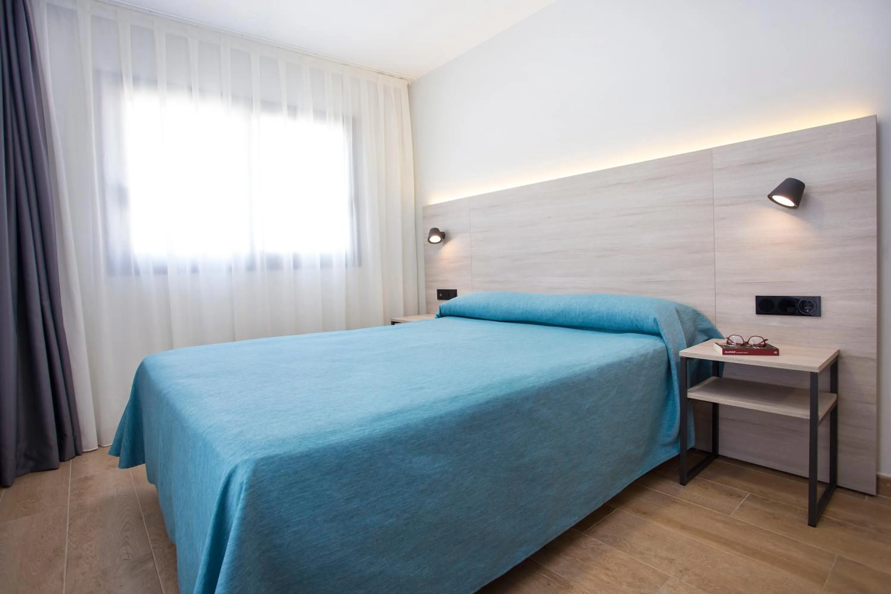 Bedroom, Bed in Apartamentos Maryciel By Mc