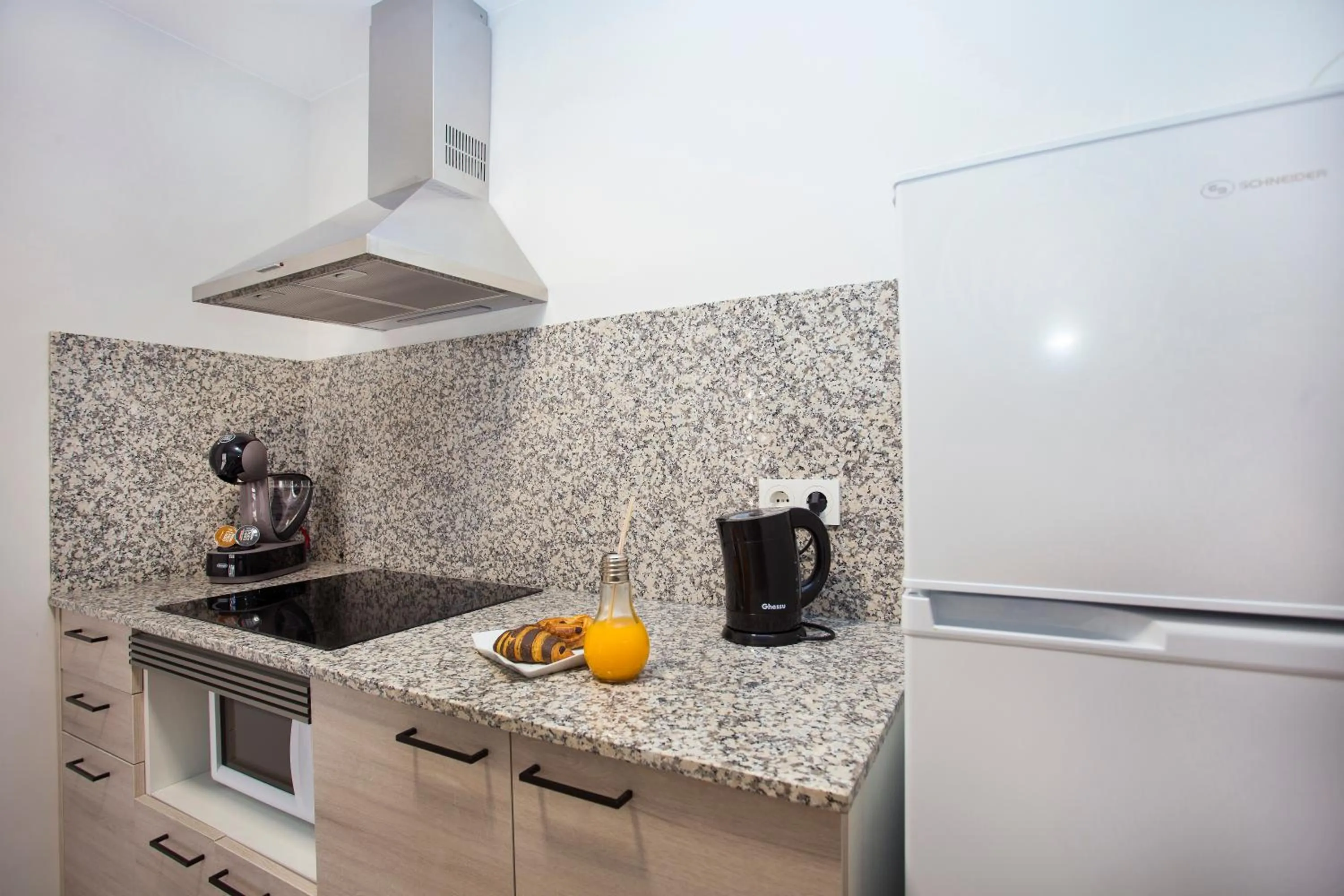 Kitchen or kitchenette in Apartamentos Maryciel By Mc