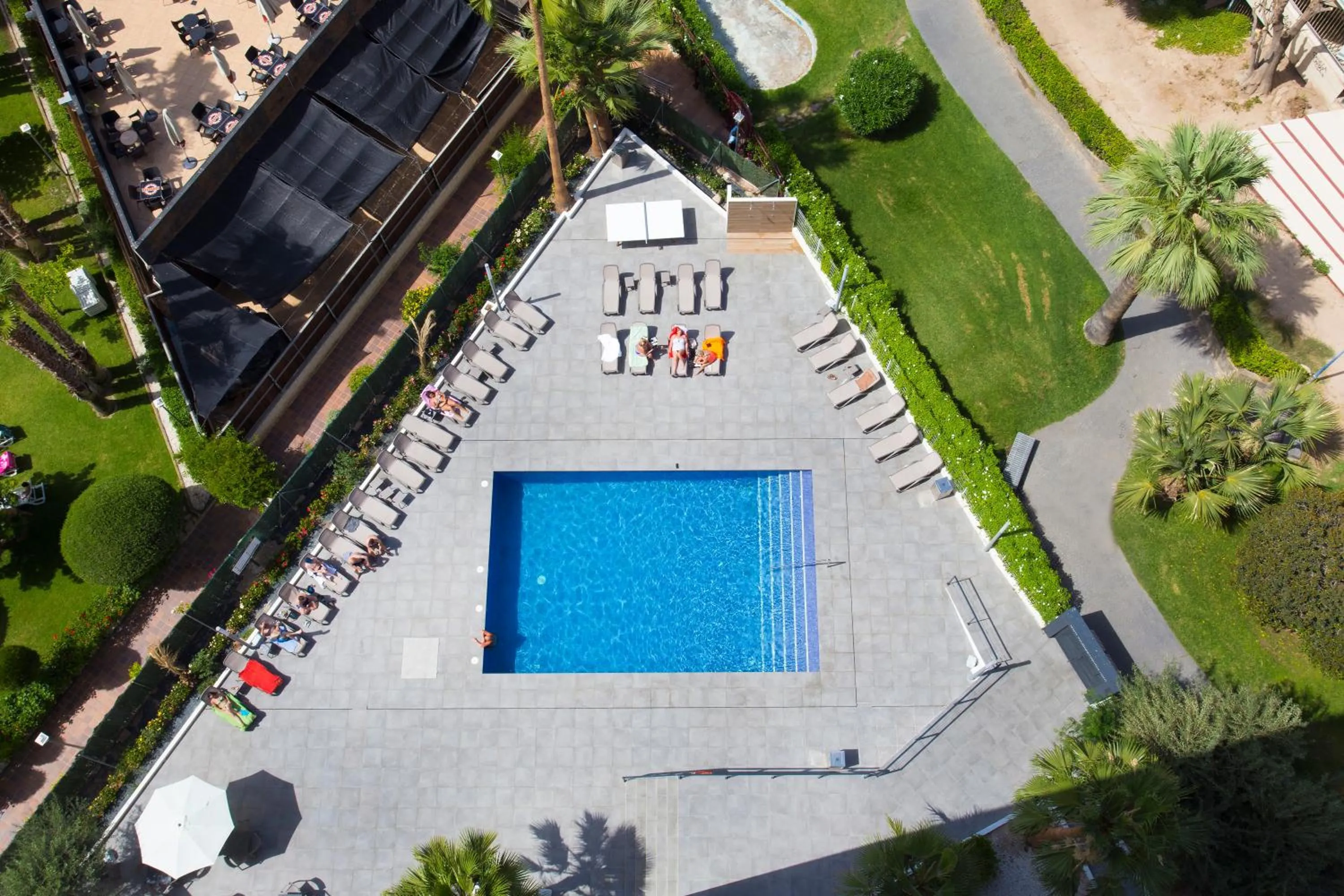 Swimming pool in Apartamentos Maryciel By Mc