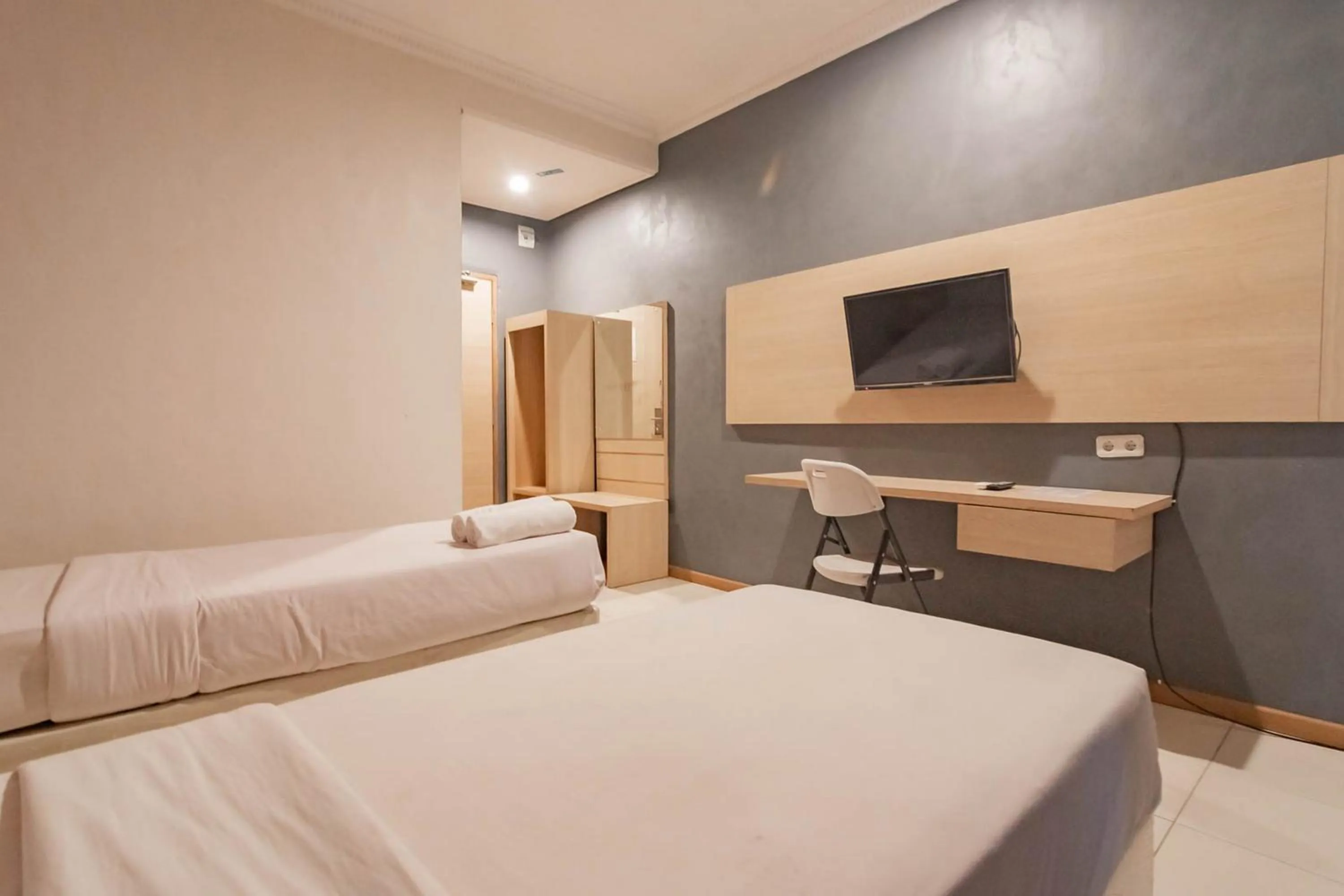 Bed in RedDoorz At Hotel Arimbi Dewi Sartika Baru