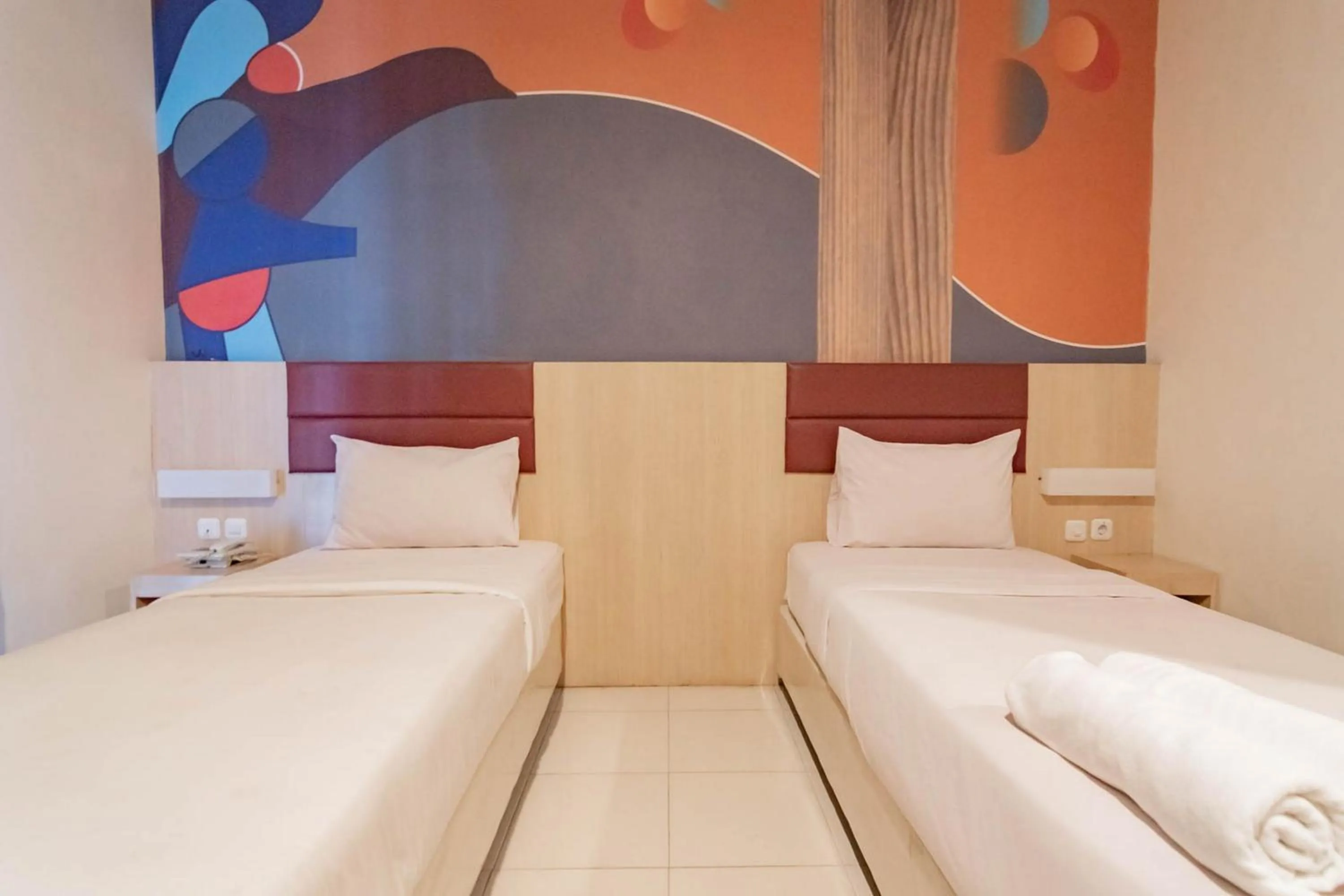 Bed in RedDoorz At Hotel Arimbi Dewi Sartika Baru