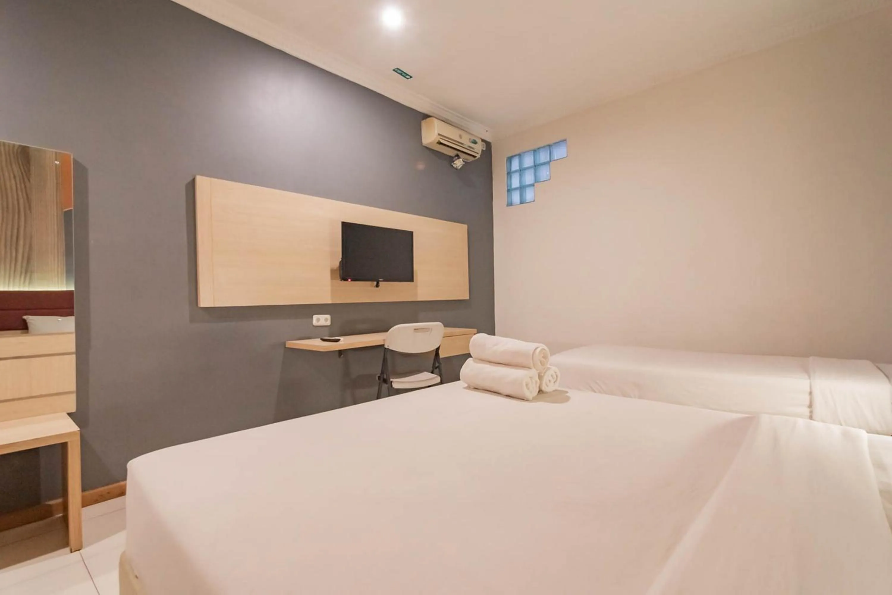 Bed in RedDoorz At Hotel Arimbi Dewi Sartika Baru