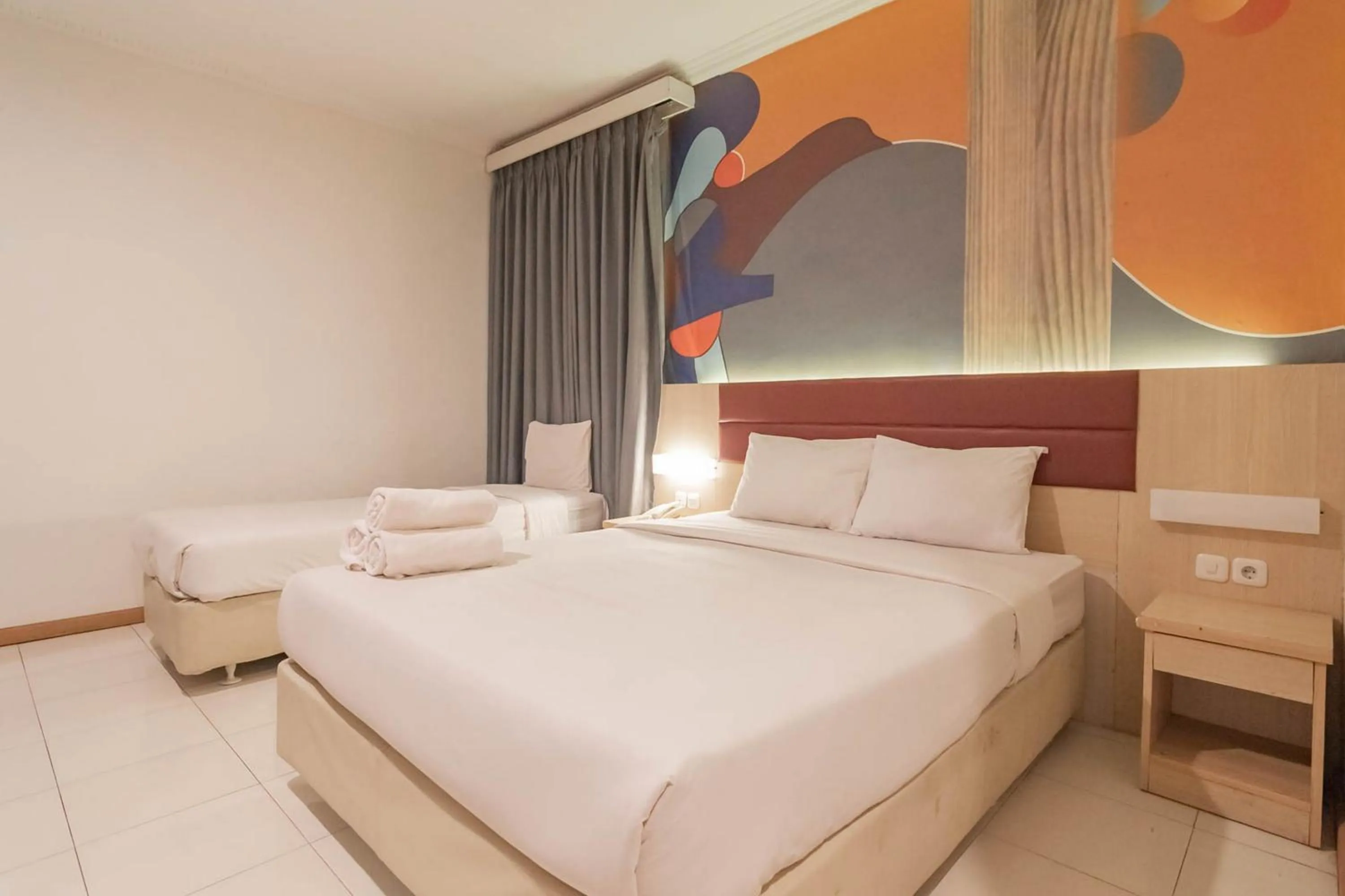 Bed in RedDoorz At Hotel Arimbi Dewi Sartika Baru