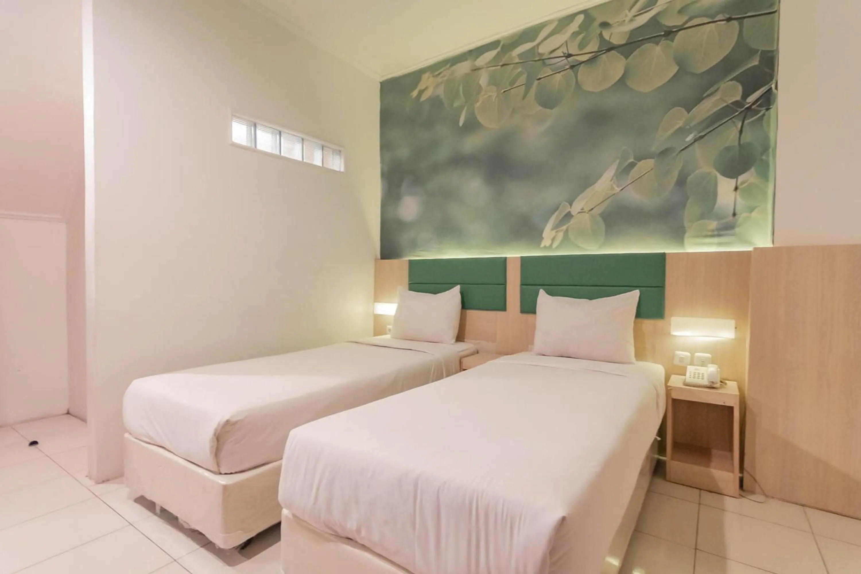 Bed in RedDoorz At Hotel Arimbi Dewi Sartika Baru