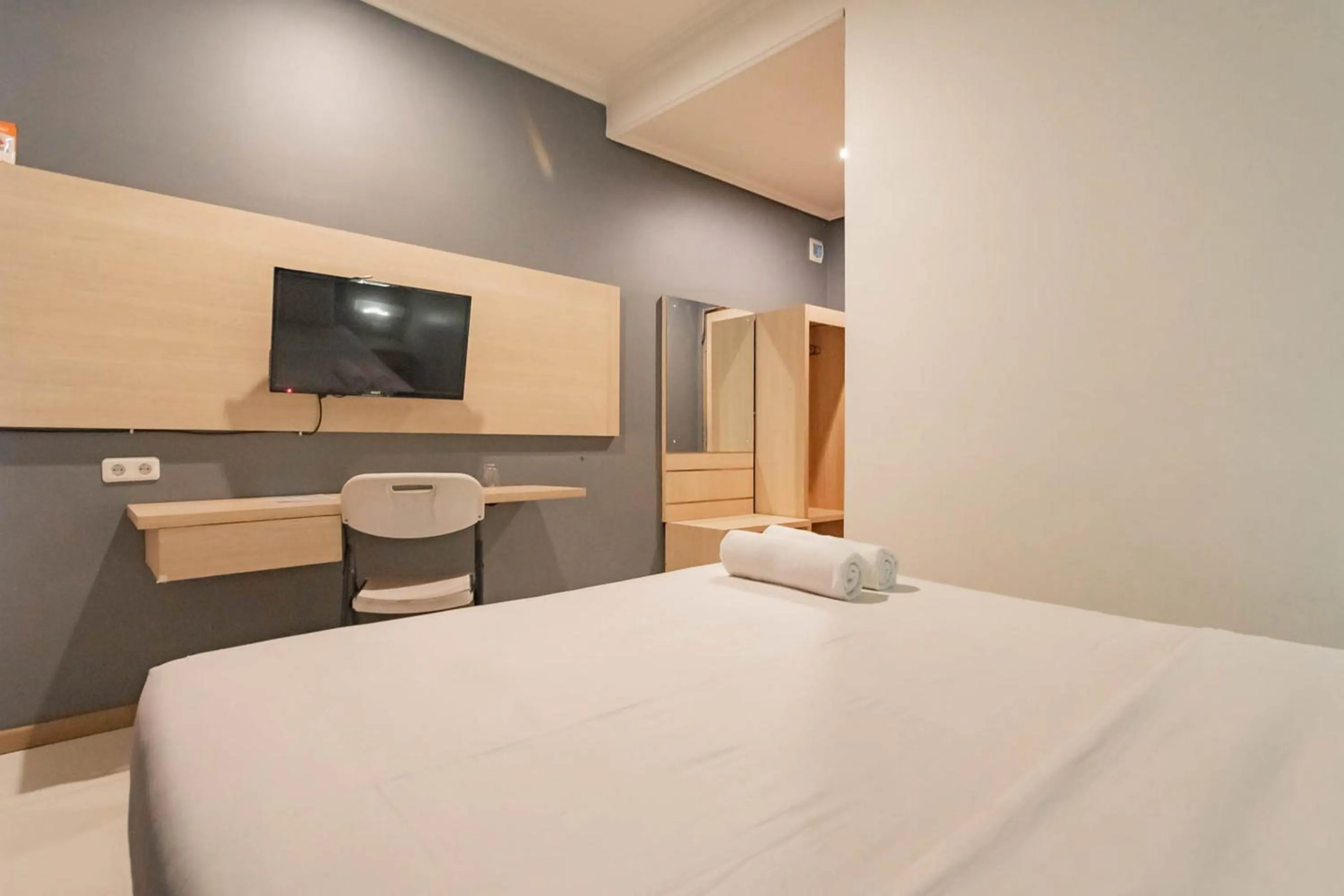 Bed in RedDoorz At Hotel Arimbi Dewi Sartika Baru