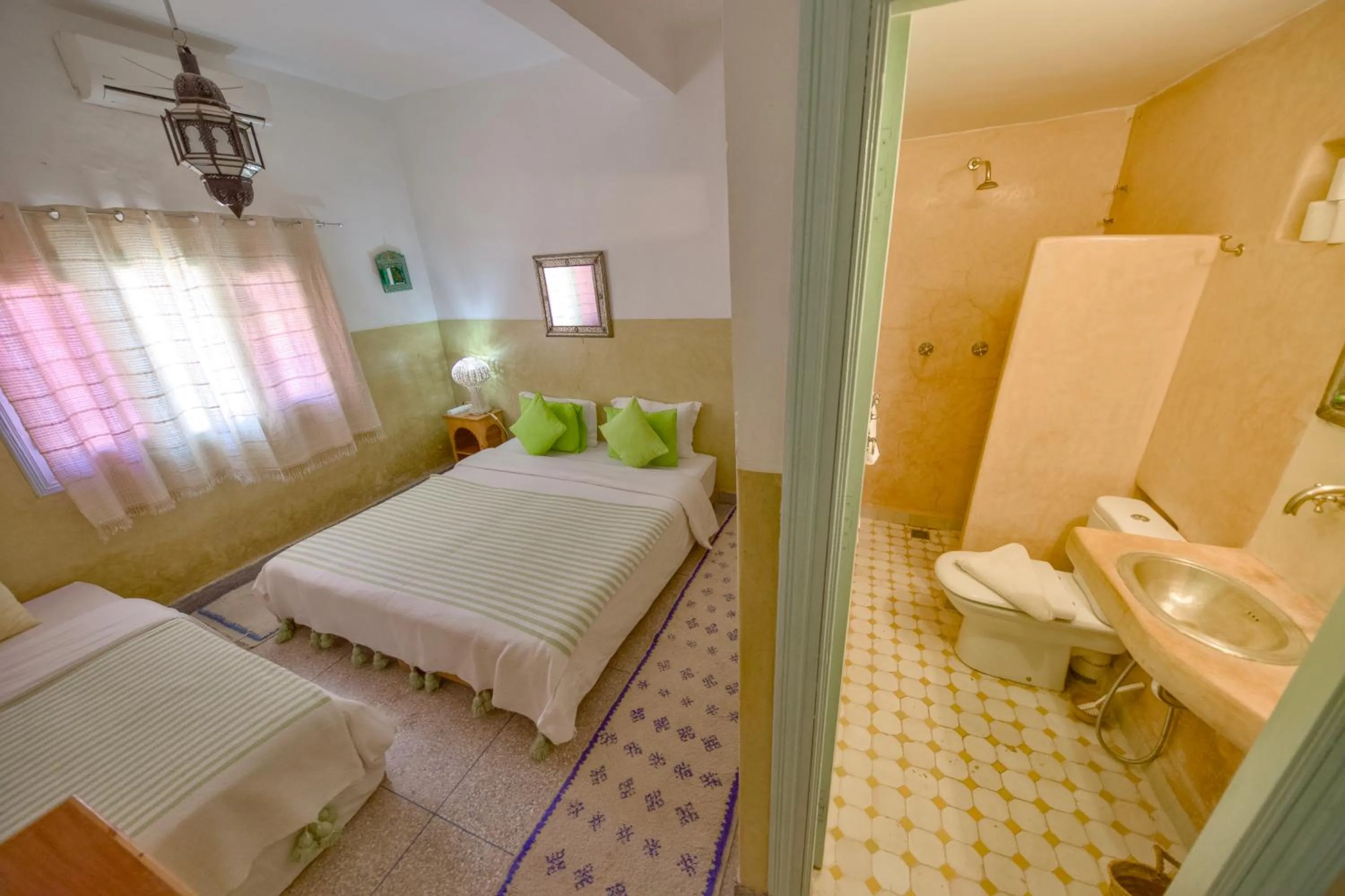 Bed in Maison d'hôtes Dar Farhana