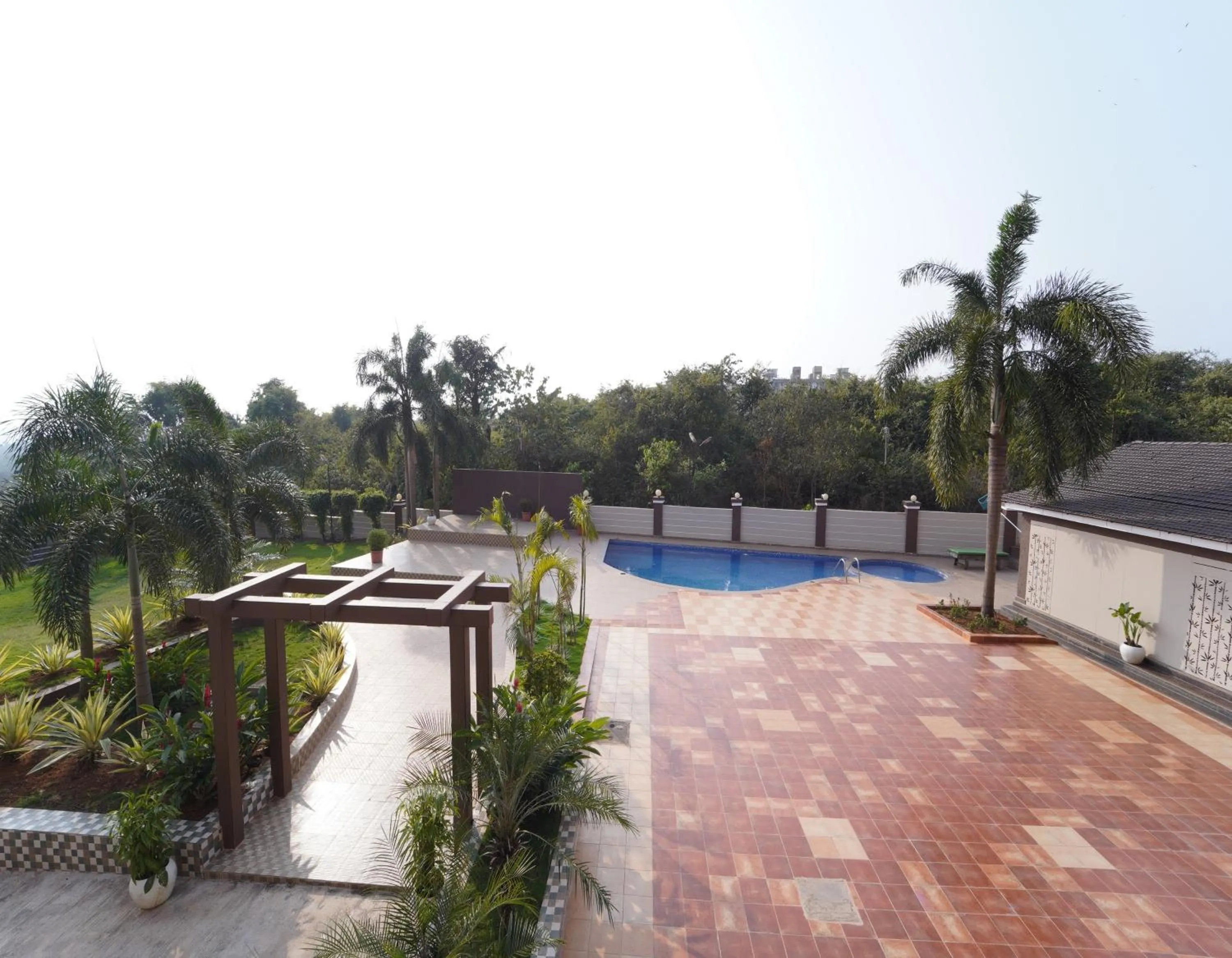 Swimming pool in FabHotel Ocean View Apartment - Dabolim