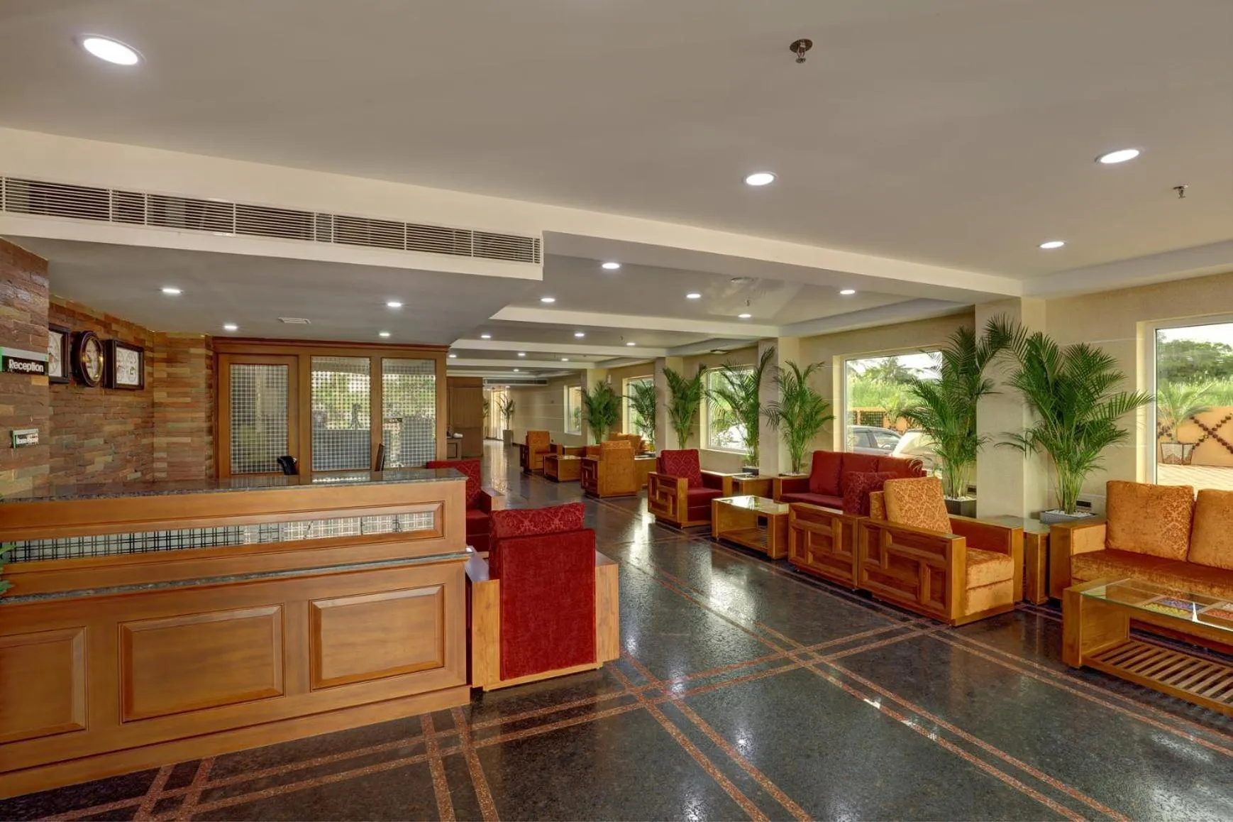 Seating area in JVK Park Hotel