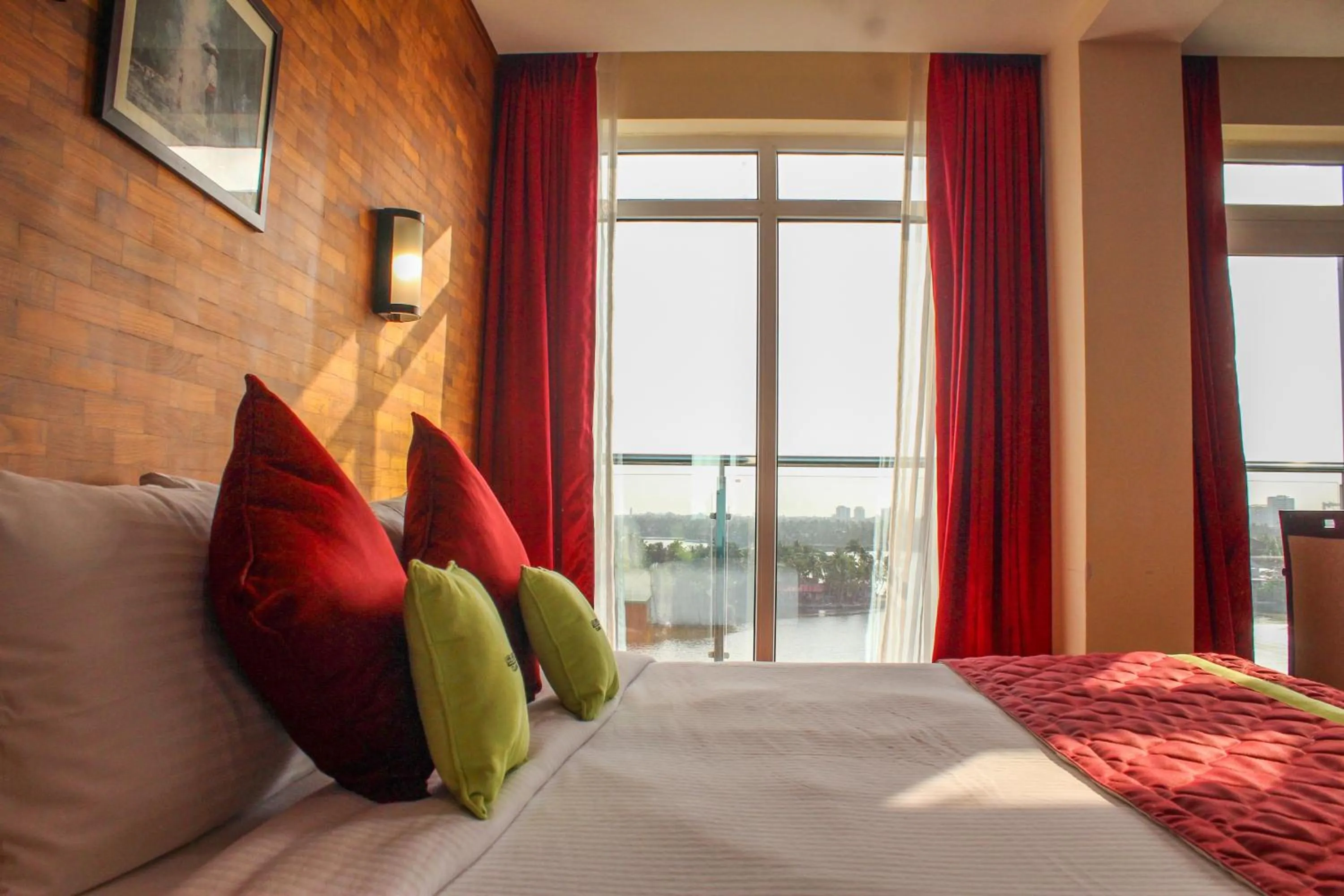 Bedroom, Bed in JVK Park Hotel