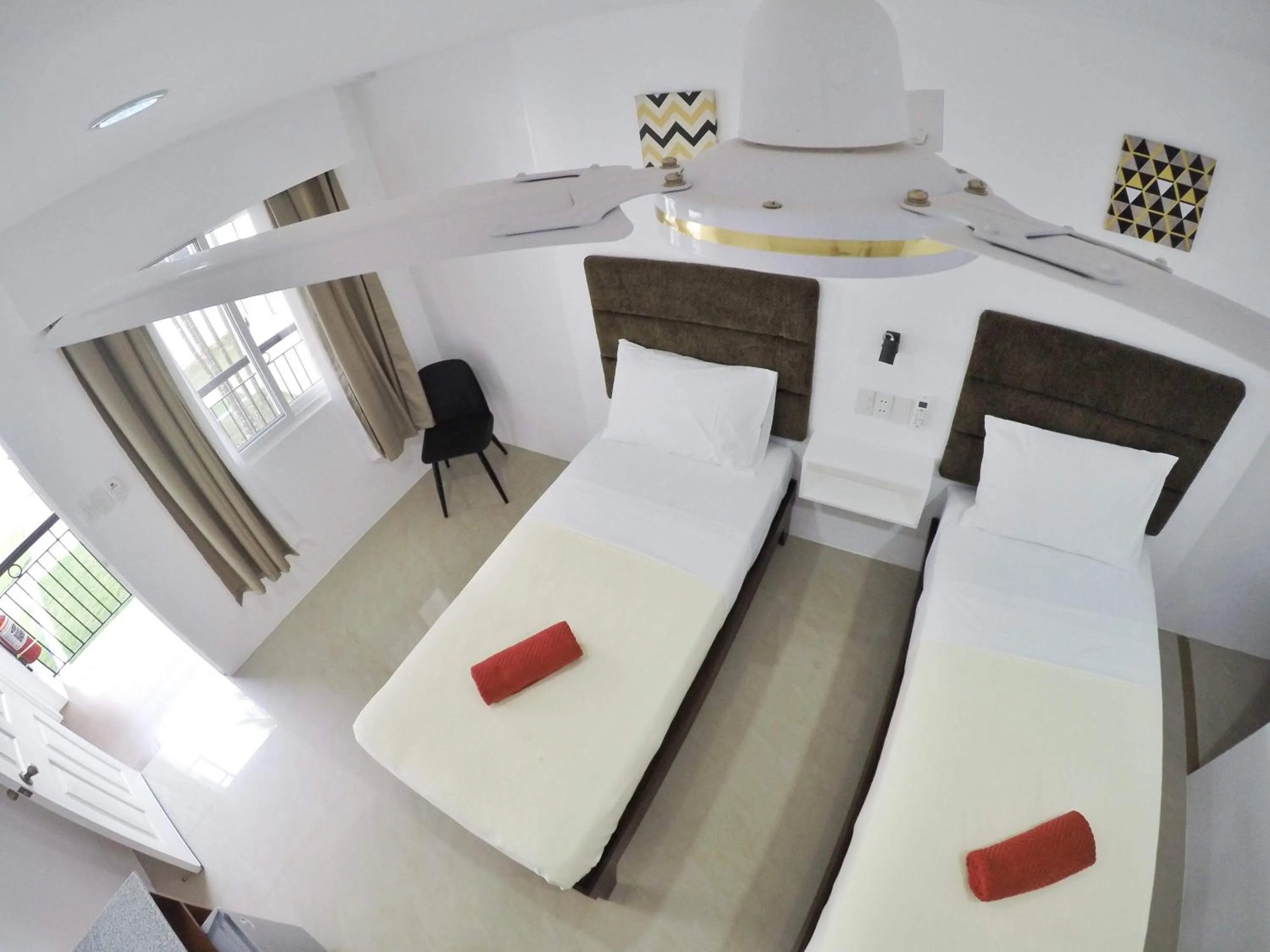Bed in Heartland Hotel Serviced Rooms & Apartments.
