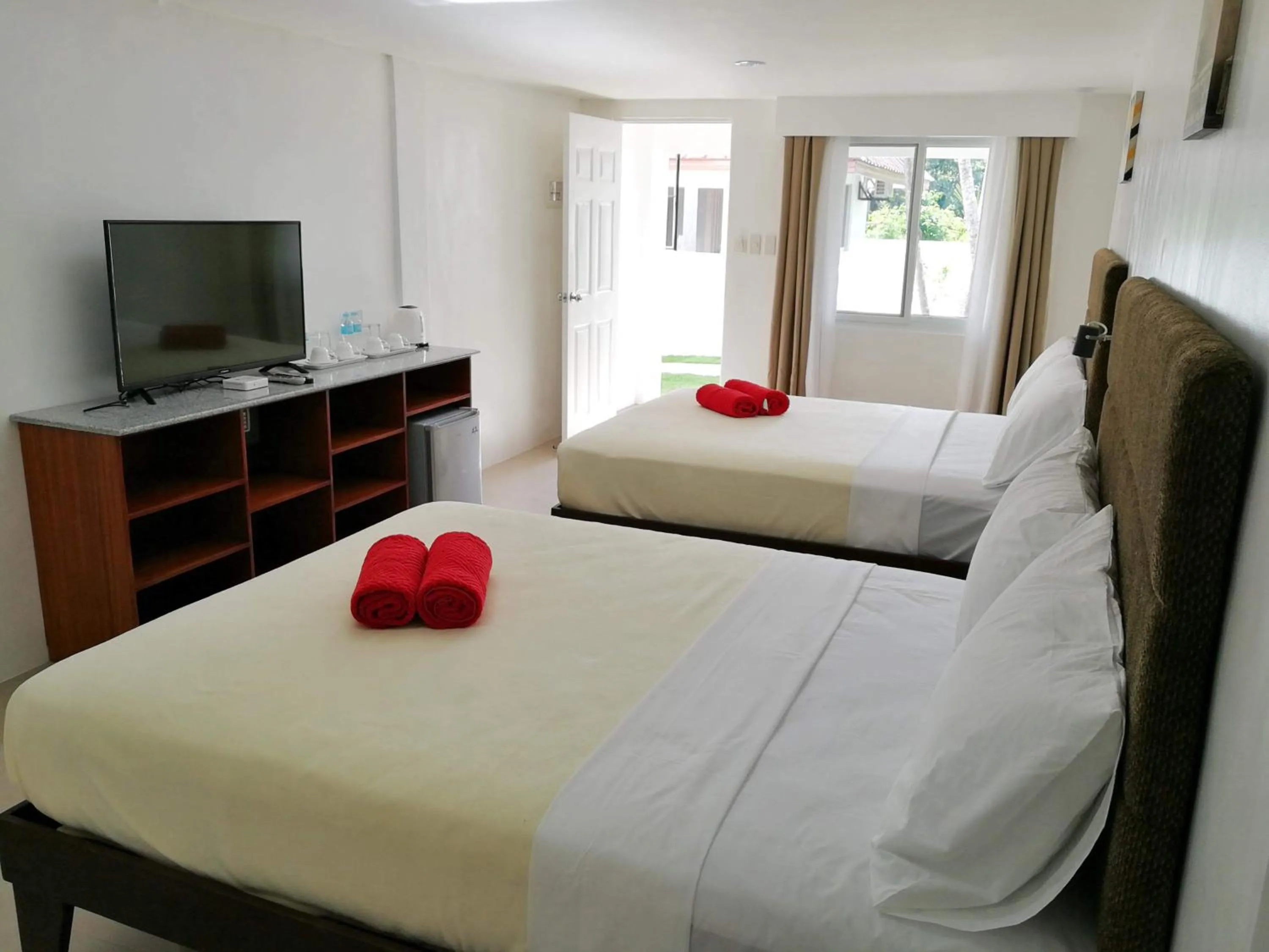Bed in Heartland Hotel Serviced Rooms & Apartments.
